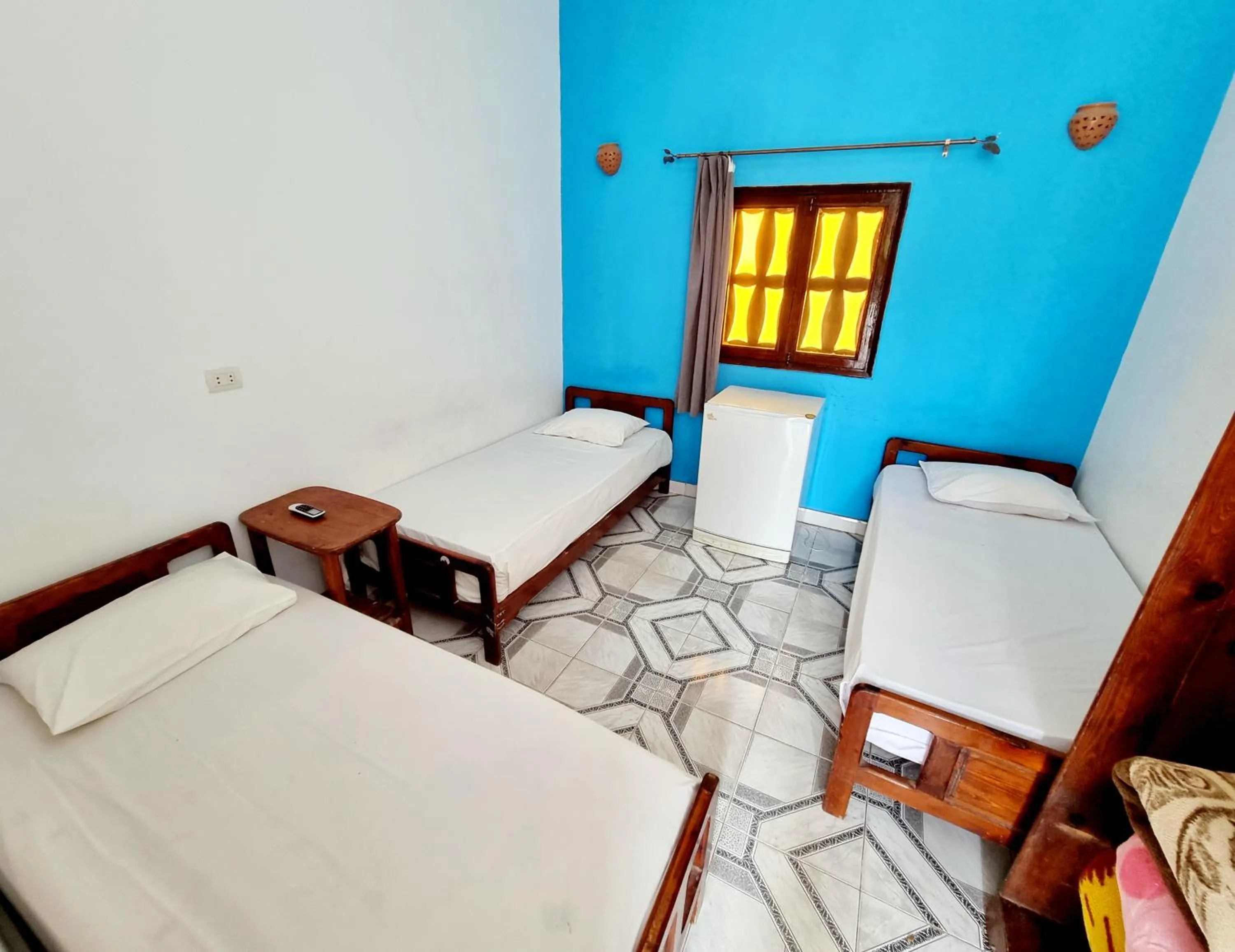 Bed in Jowhara Hotel