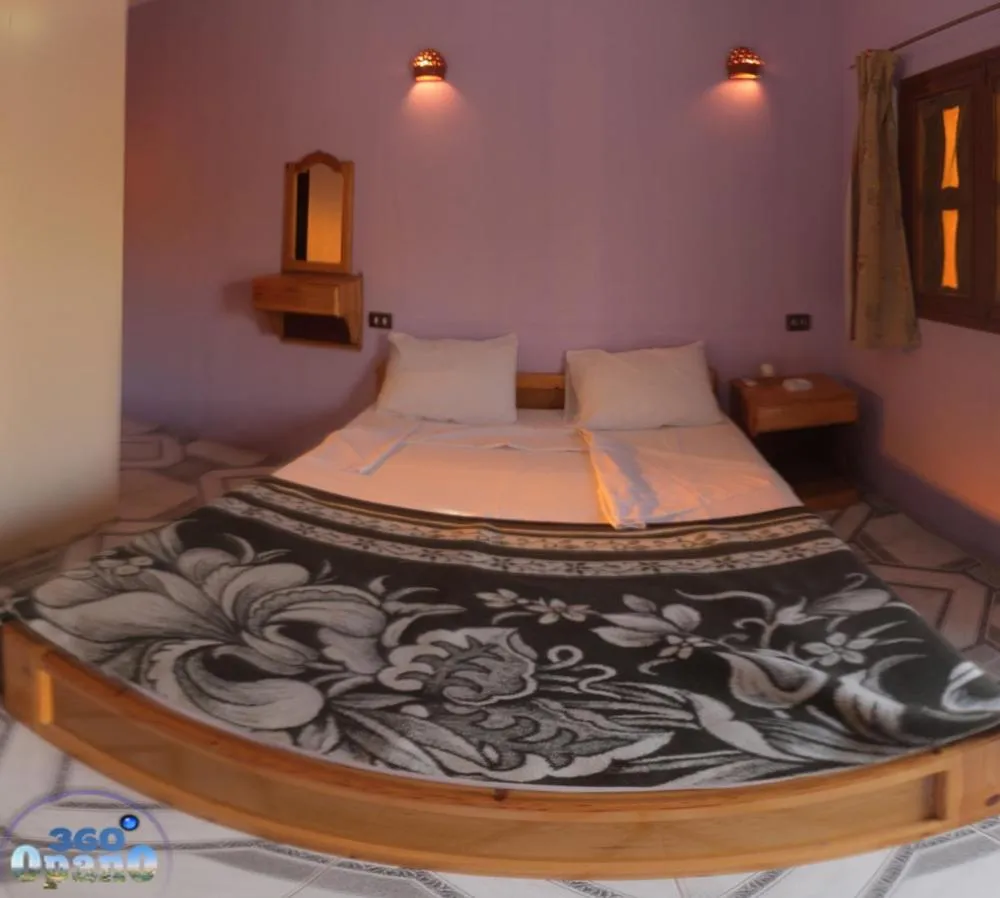 Bed in Jowhara Hotel