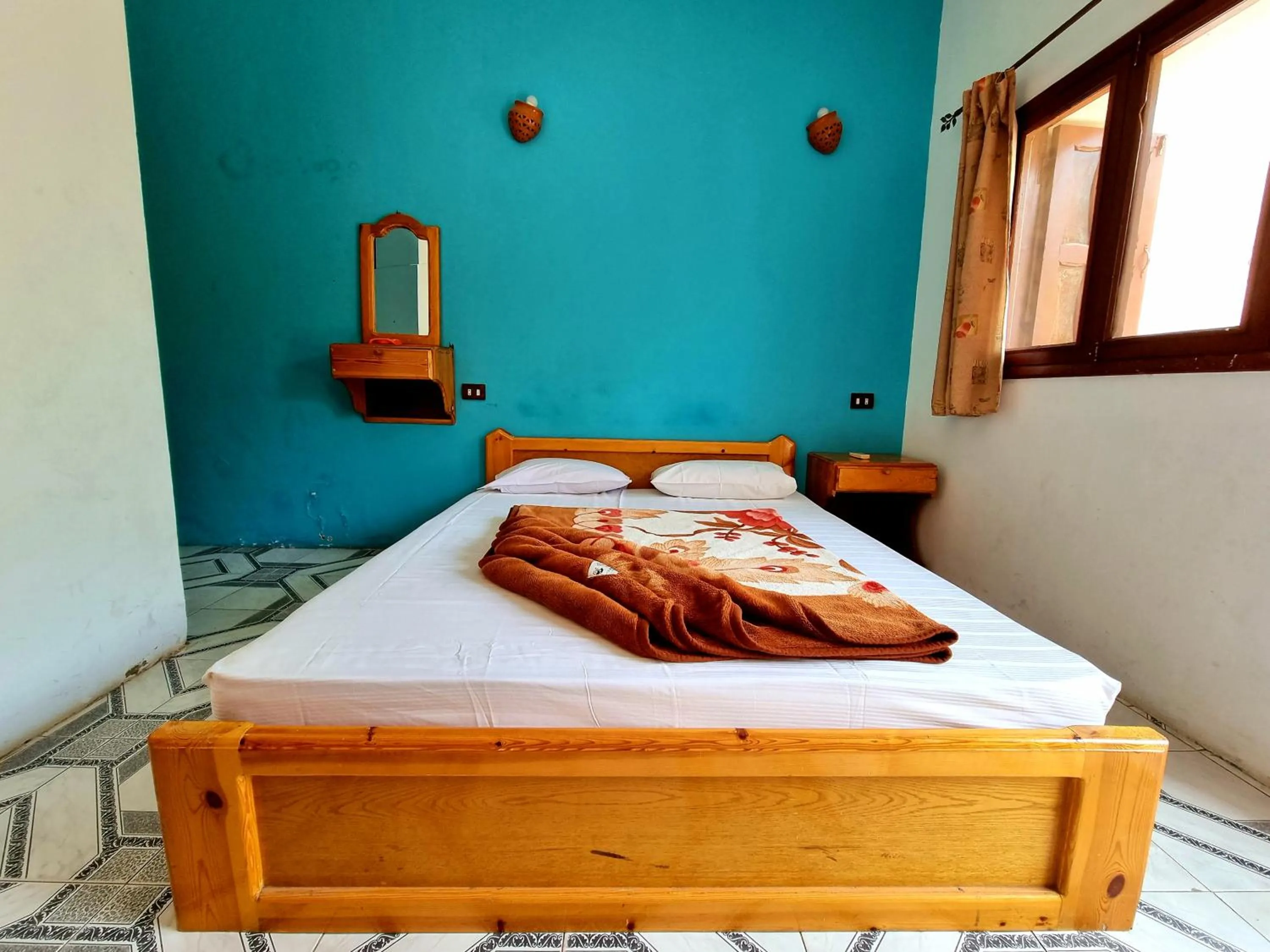 Bed in Jowhara Hotel