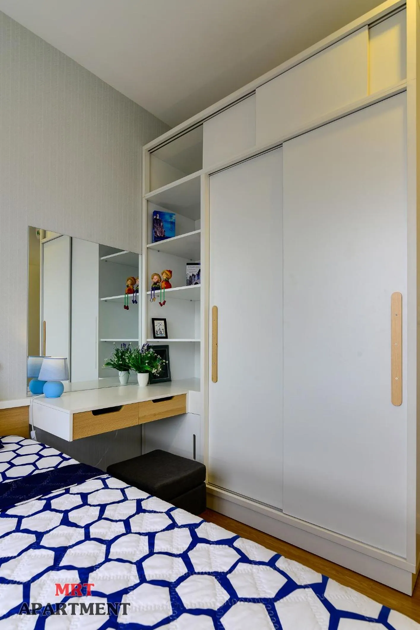 Bed in MRT Apartment In Masteri Thao Dien