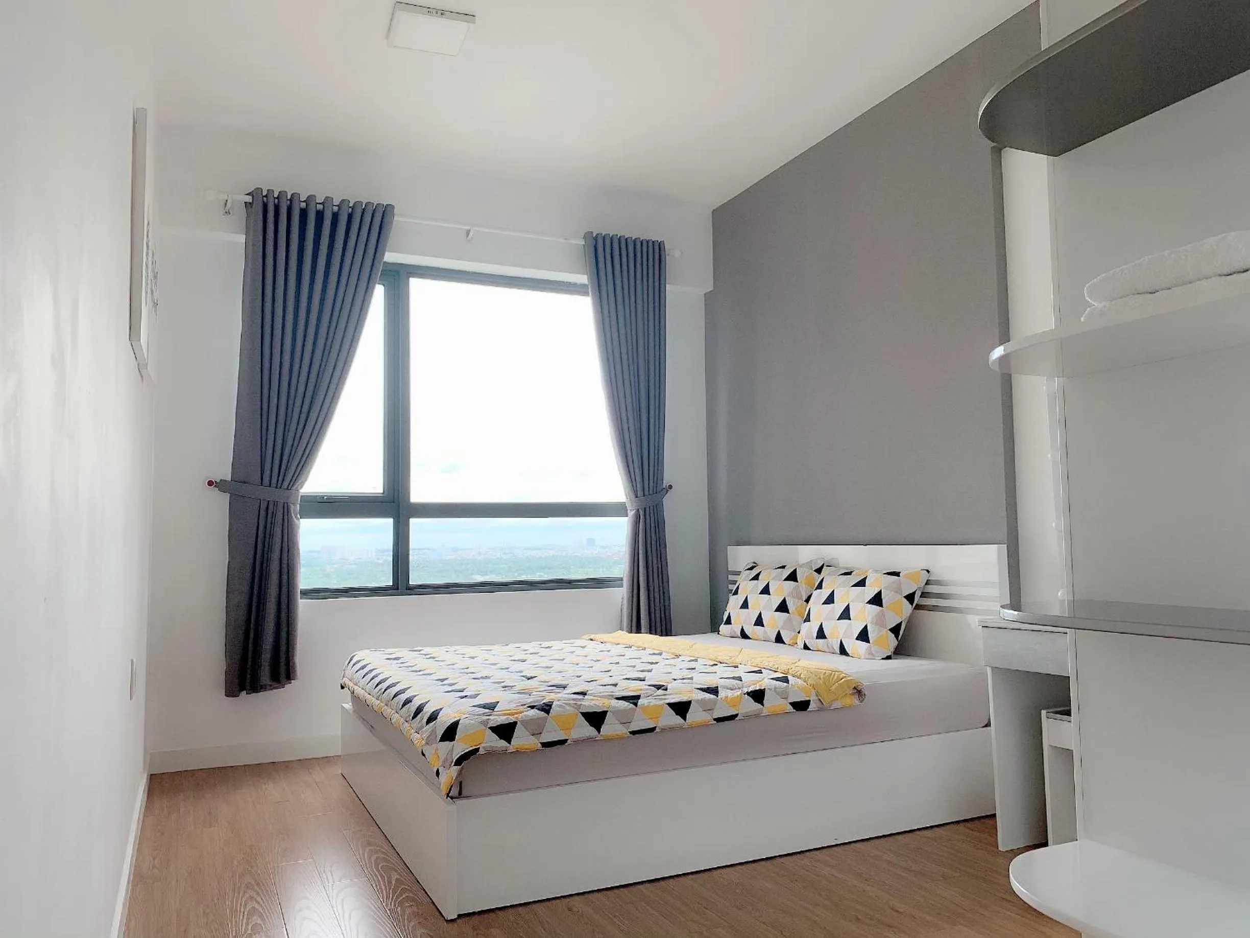 Bed in MRT Apartment In Masteri Thao Dien
