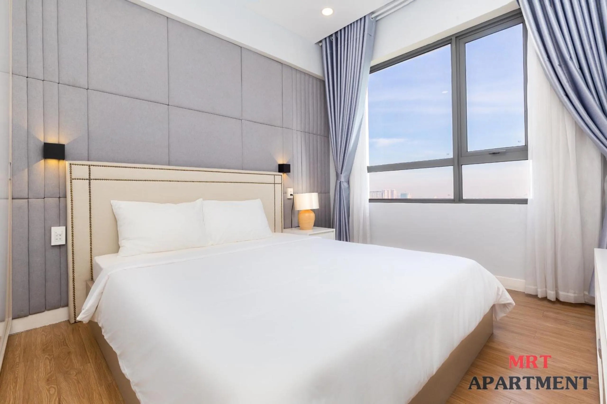 Bed in MRT Apartment In Masteri Thao Dien