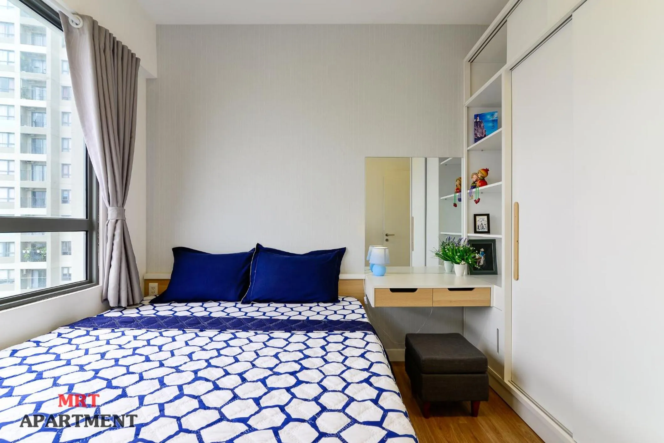 Bed in MRT Apartment In Masteri Thao Dien