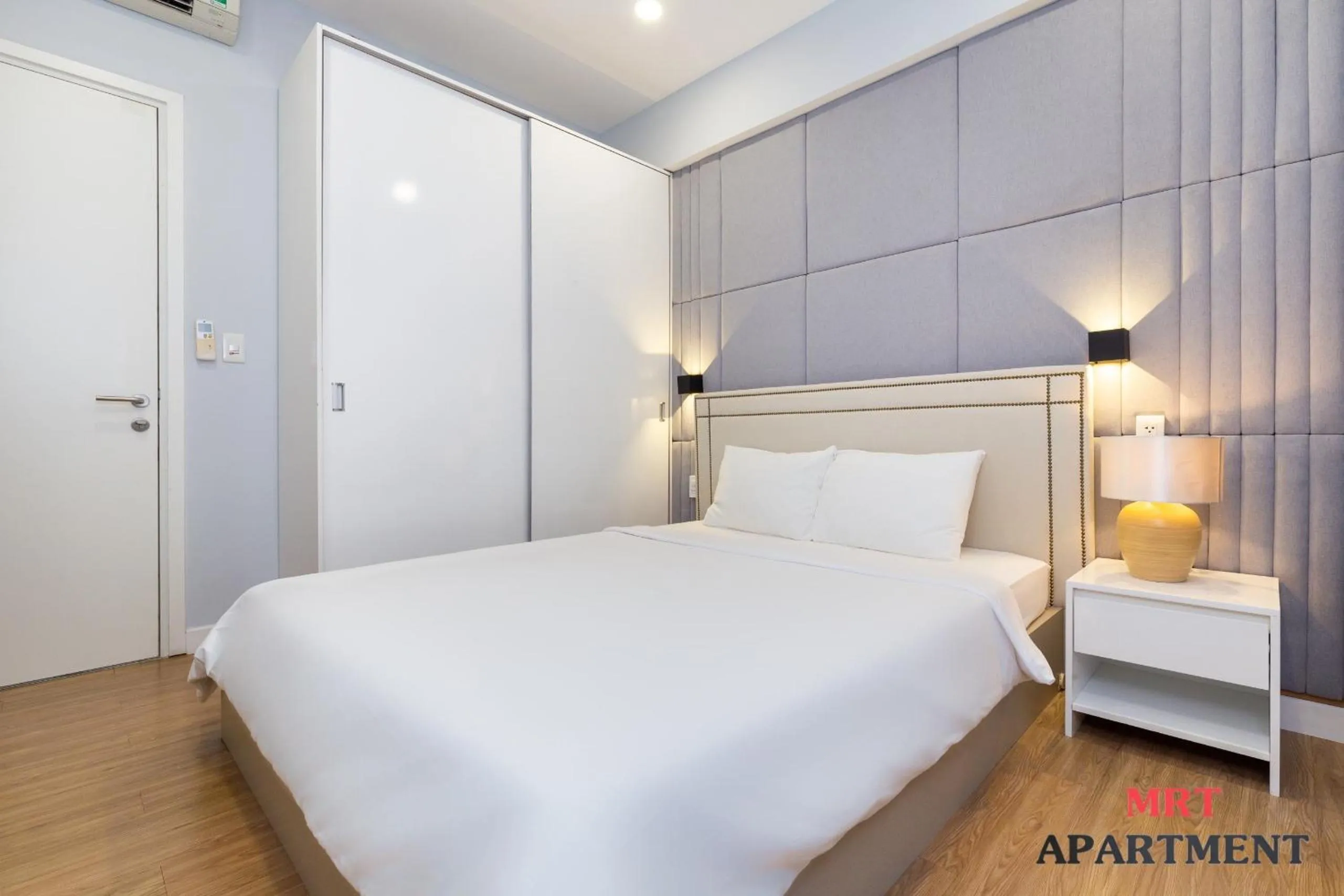 Bed in MRT Apartment In Masteri Thao Dien