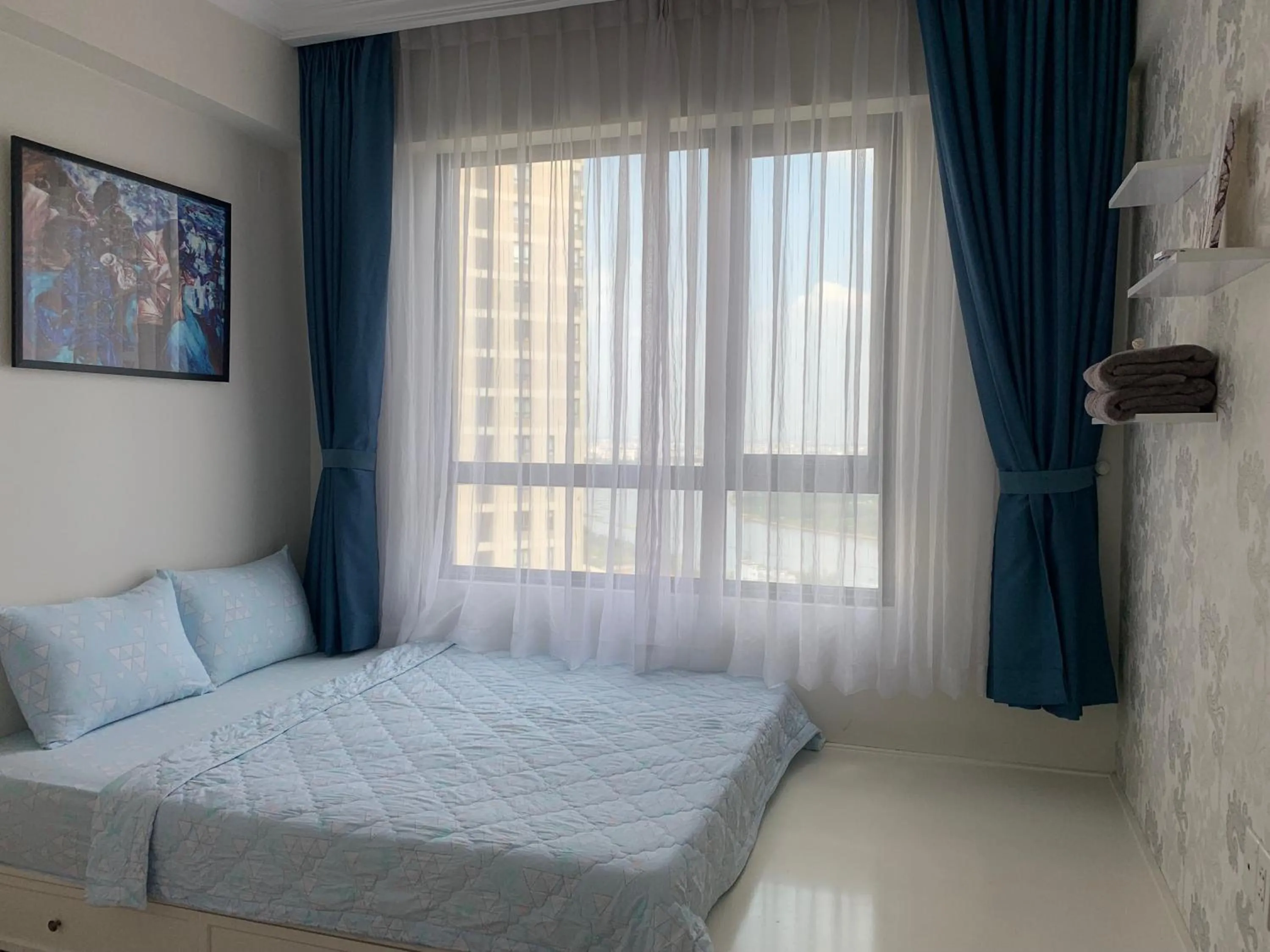 Bed in MRT Apartment In Masteri Thao Dien