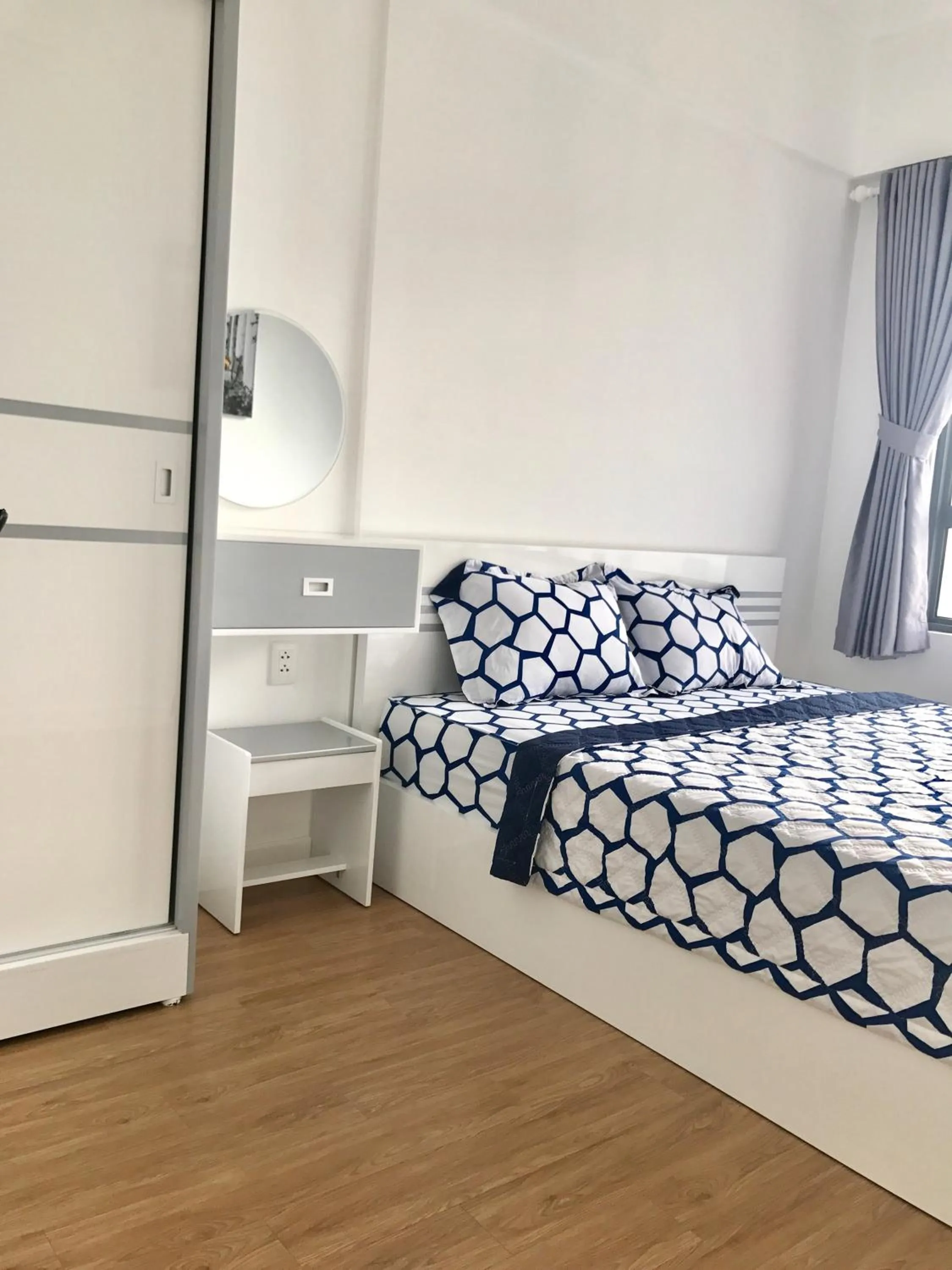 Bed in MRT Apartment In Masteri Thao Dien