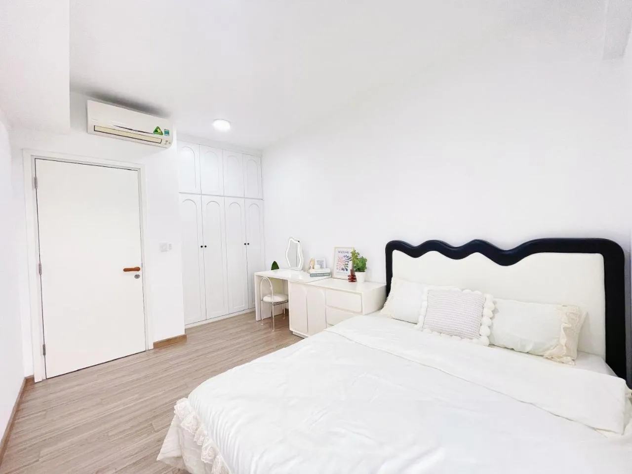 Bed in MRT Apartment In Masteri Thao Dien