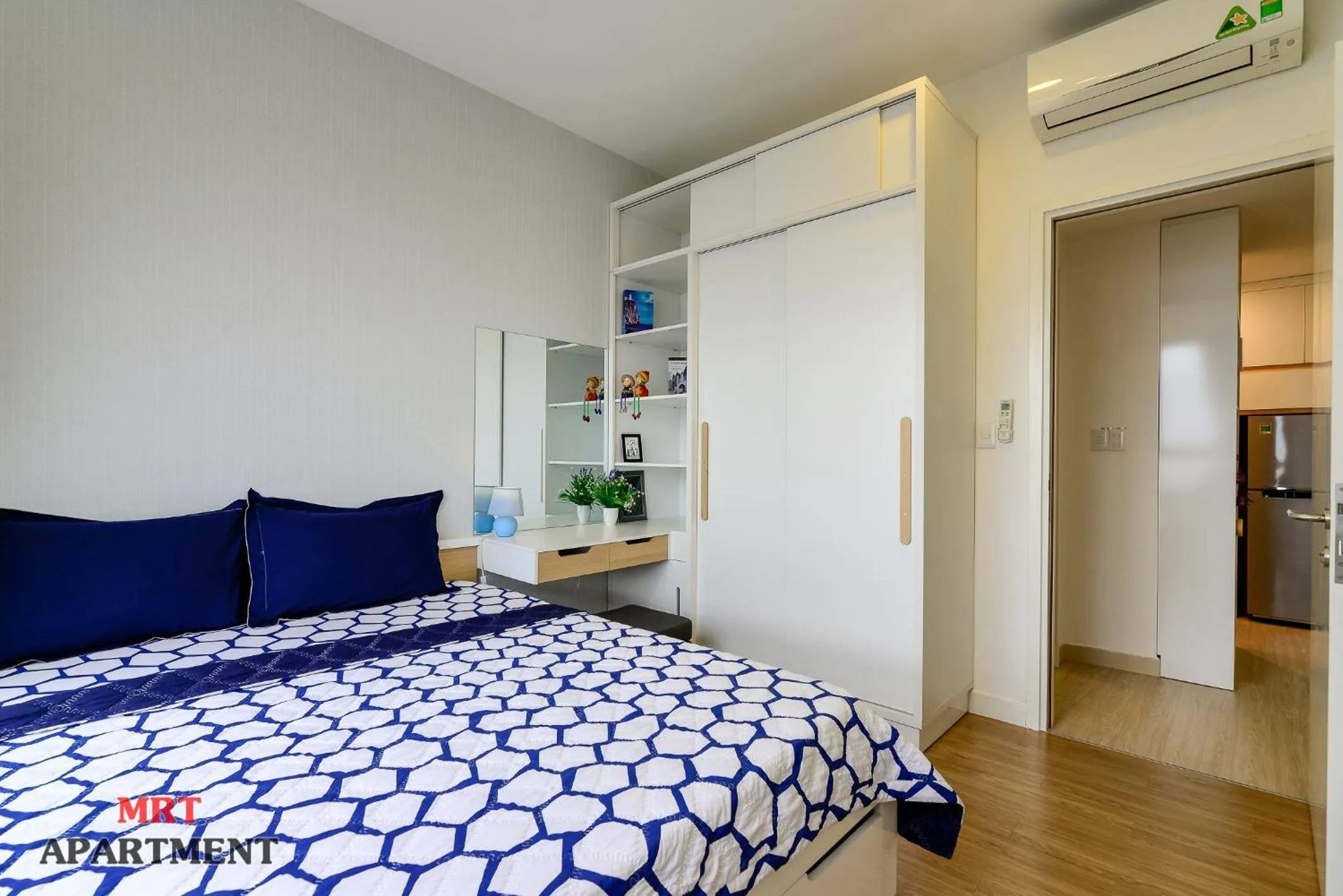 Bed in MRT Apartment In Masteri Thao Dien