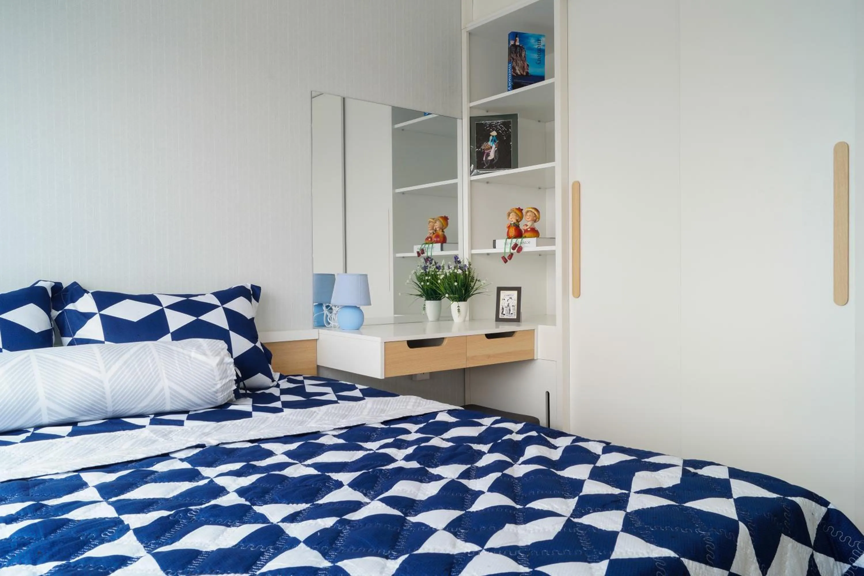 Bed in MRT Apartment In Masteri Thao Dien