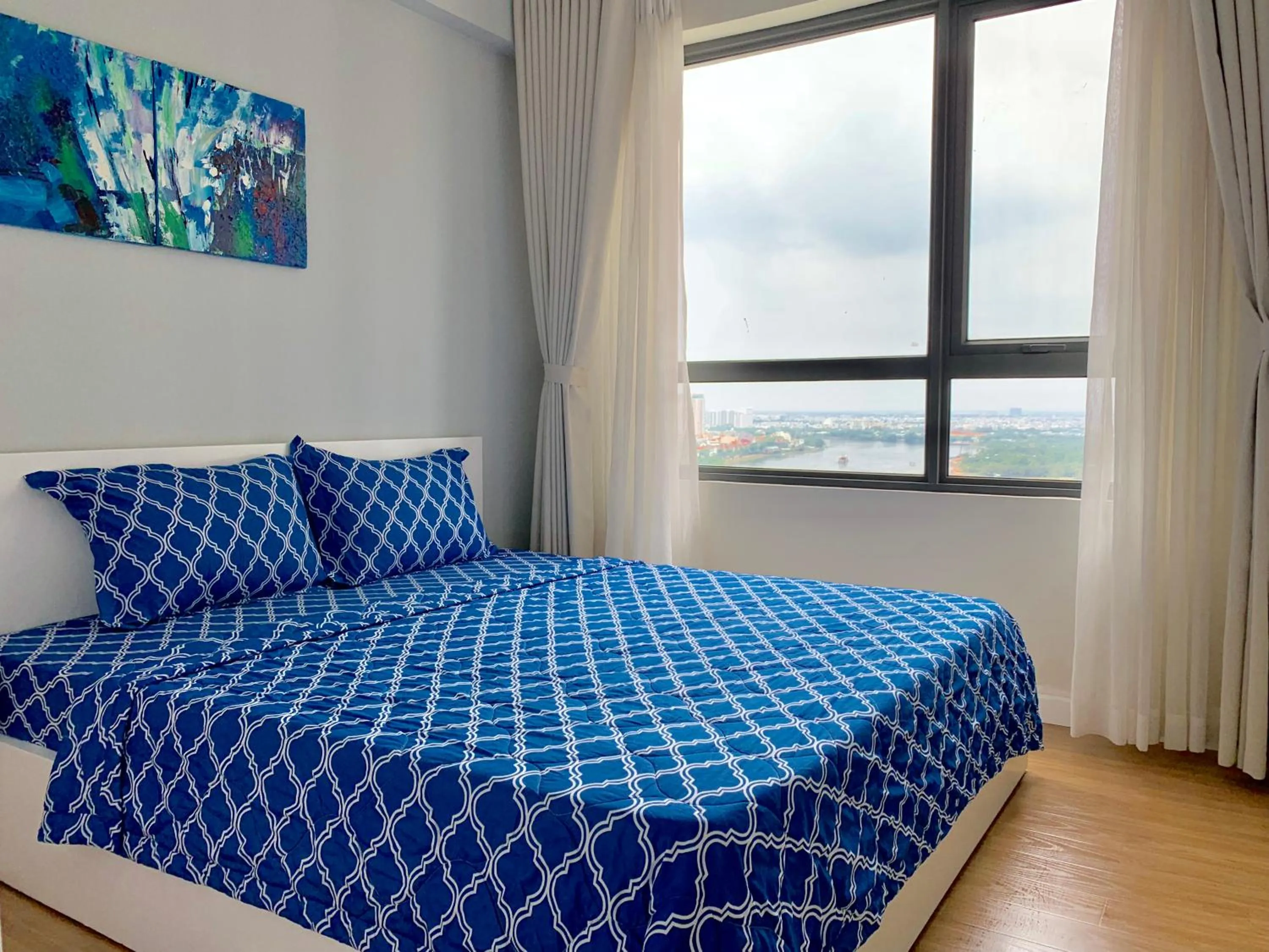 Bed in MRT Apartment In Masteri Thao Dien