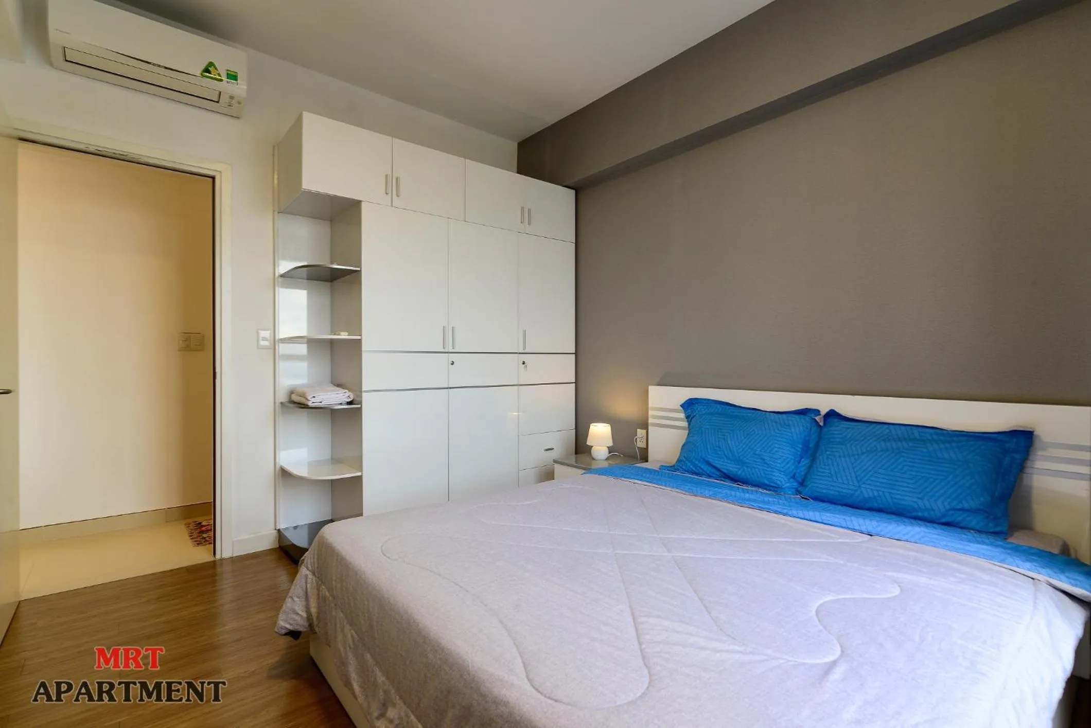 Bed in MRT Apartment In Masteri Thao Dien