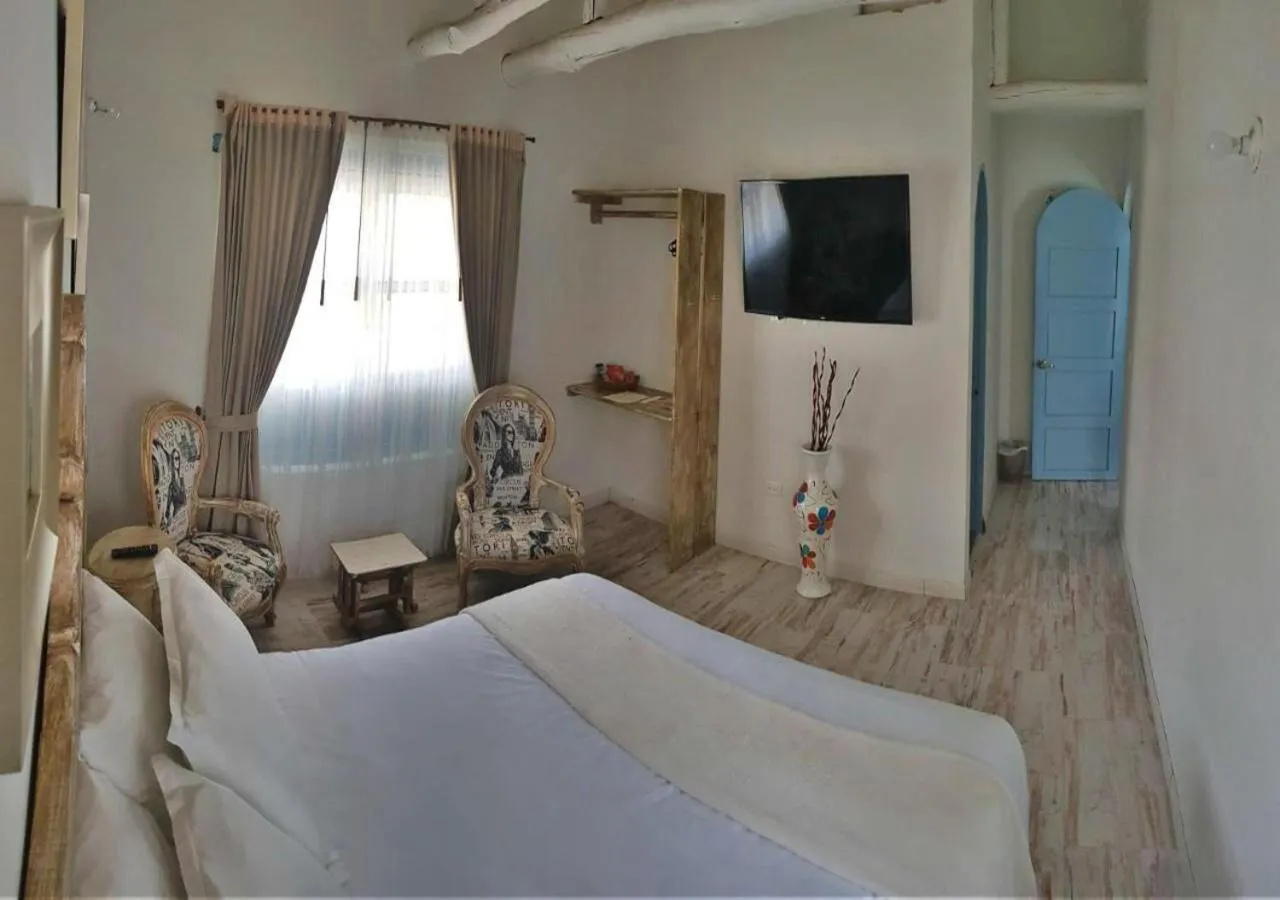 Photo of the whole room, Bed in HOTEL BOUTIQUE Santa Helena