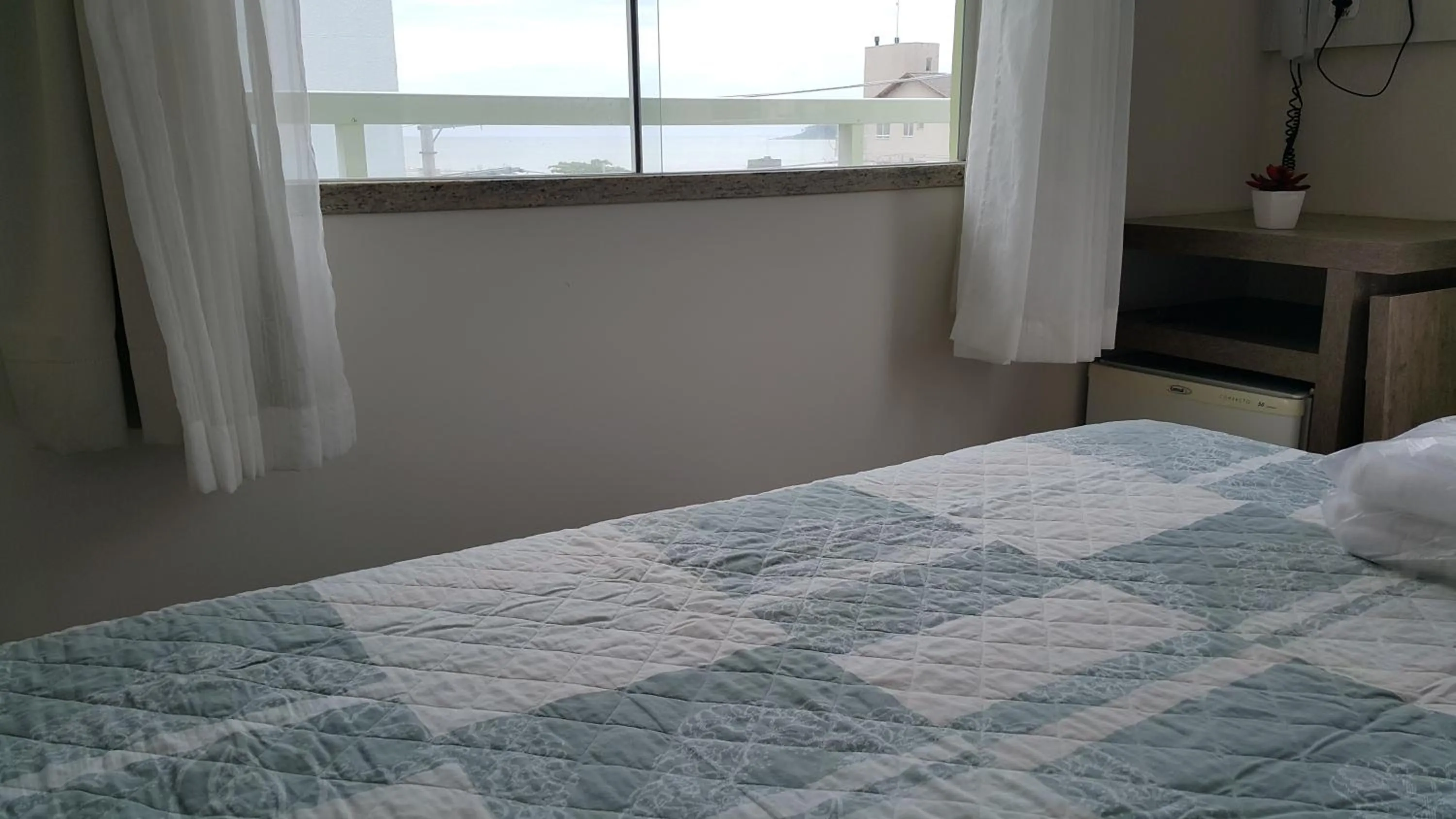 Bed in Pousada Bomar Bombinhas