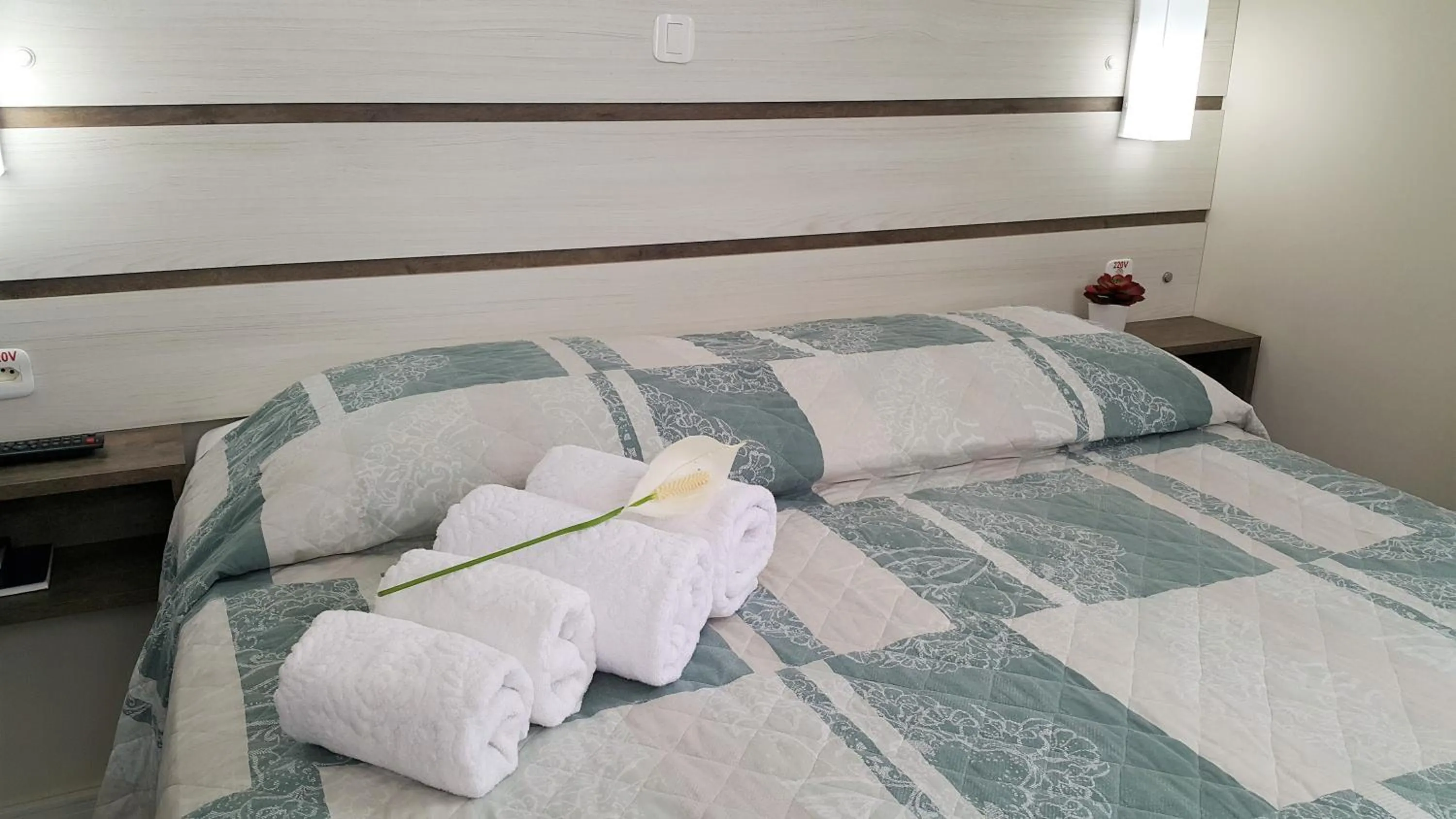 Bed in Pousada Bomar Bombinhas