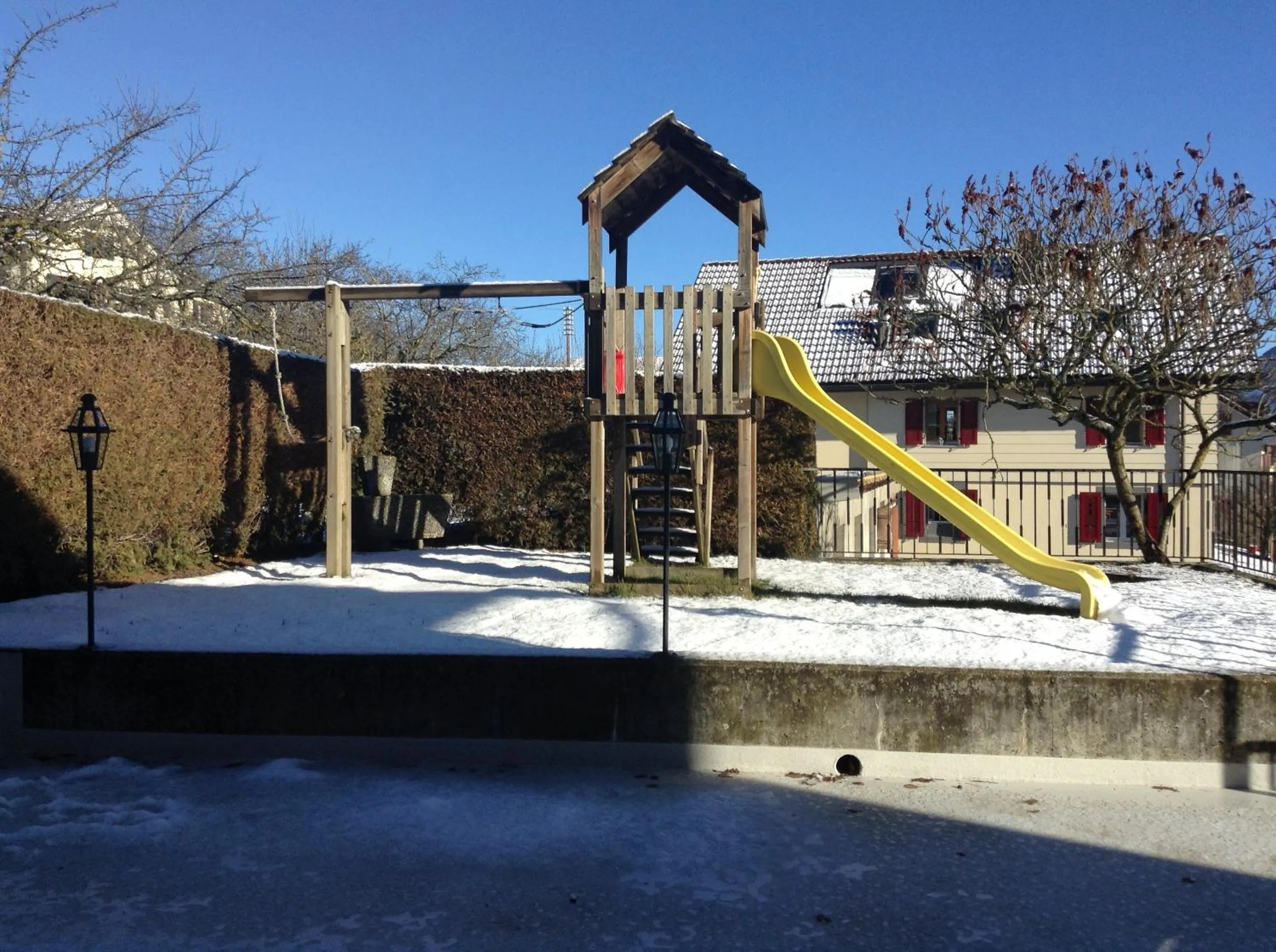 Children play ground in Hôtel Restaurant le Gruyérien