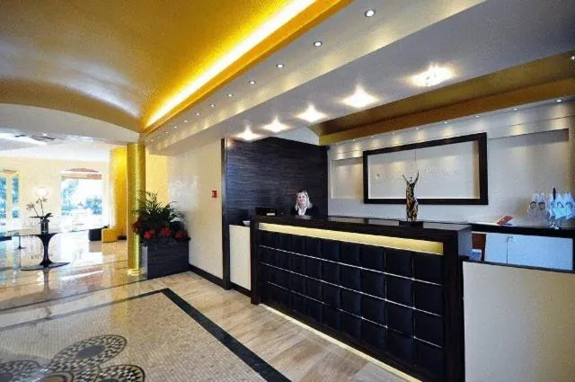 Lobby or reception in OC Hotel