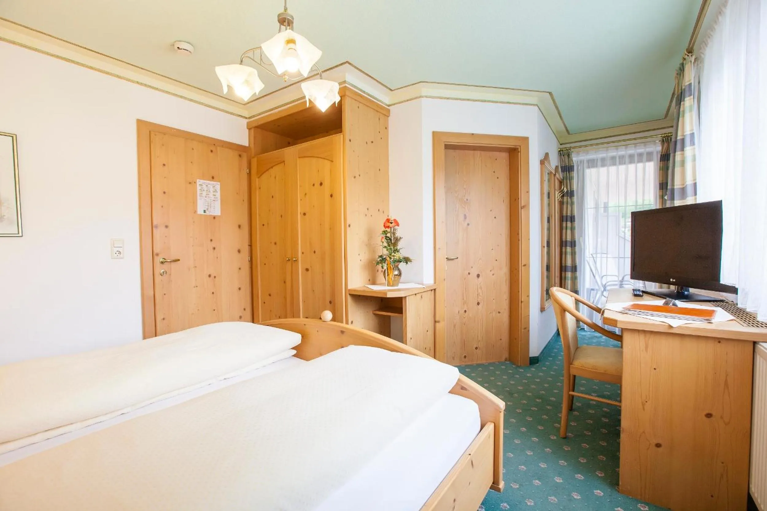 Bed in Hotel & Appartements Alpenresidenz Viktoria