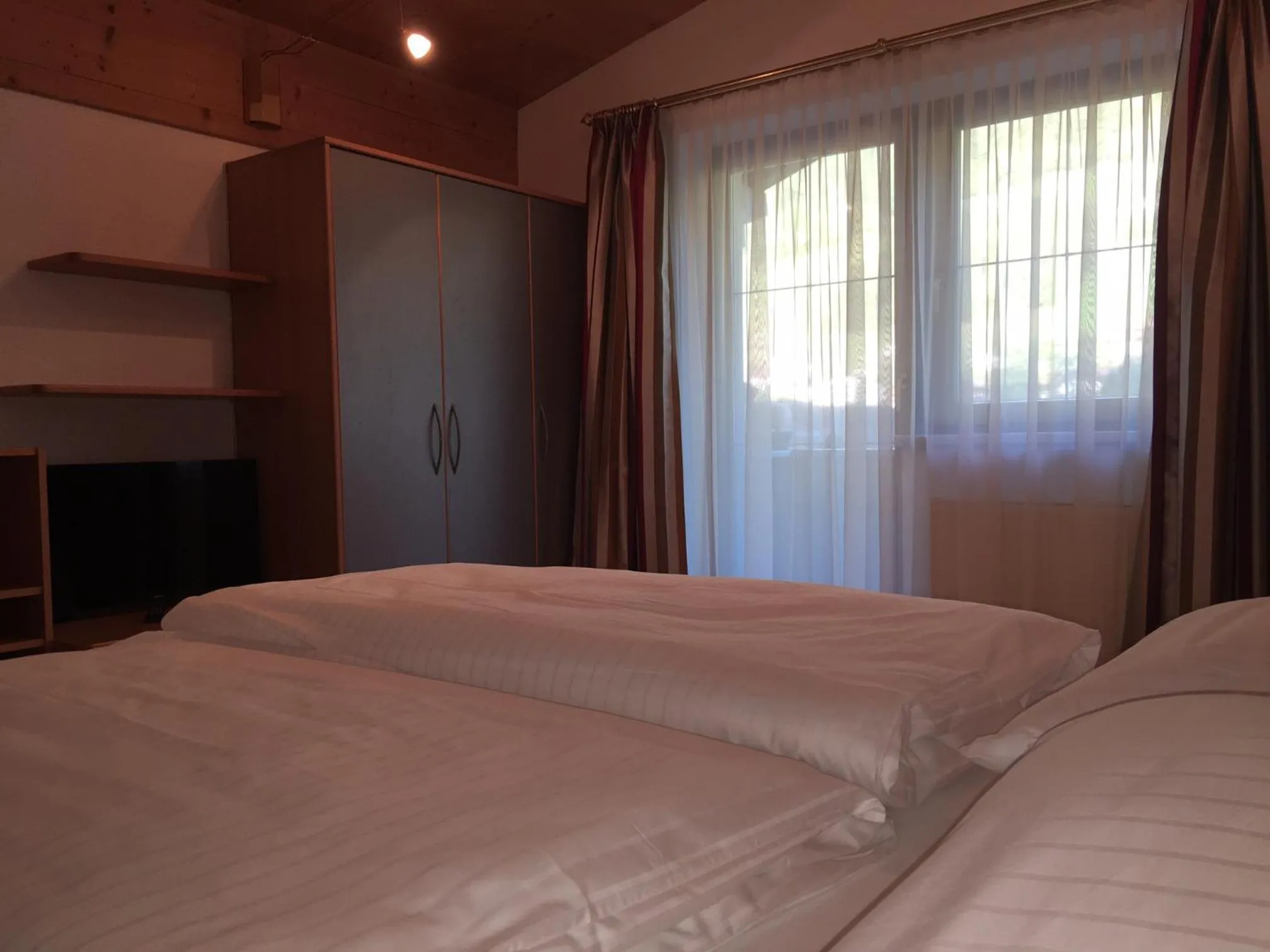 Bedroom, Bed in Hotel & Appartements Alpenresidenz Viktoria