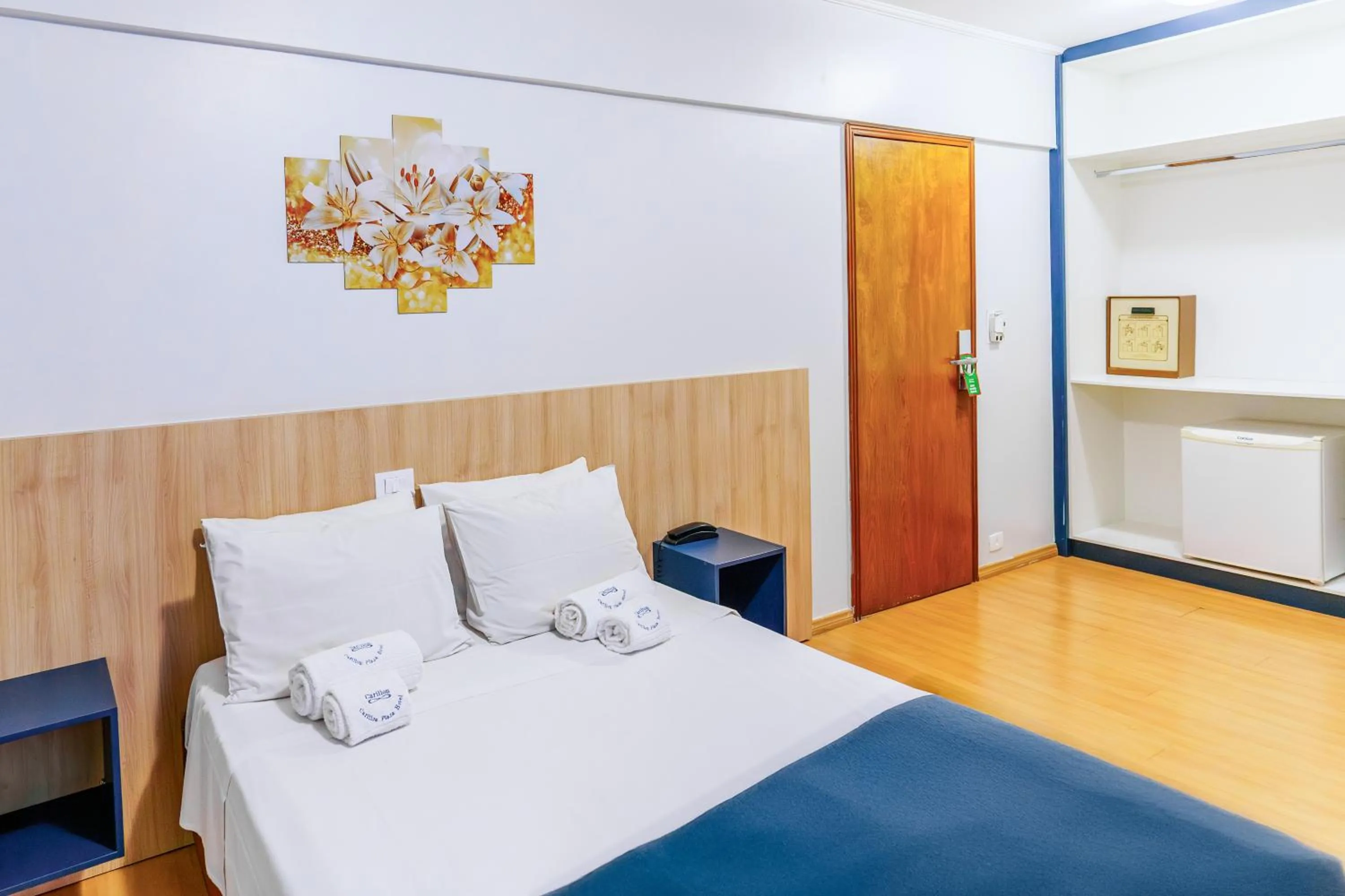 Bed in Carillon Plaza Hotel