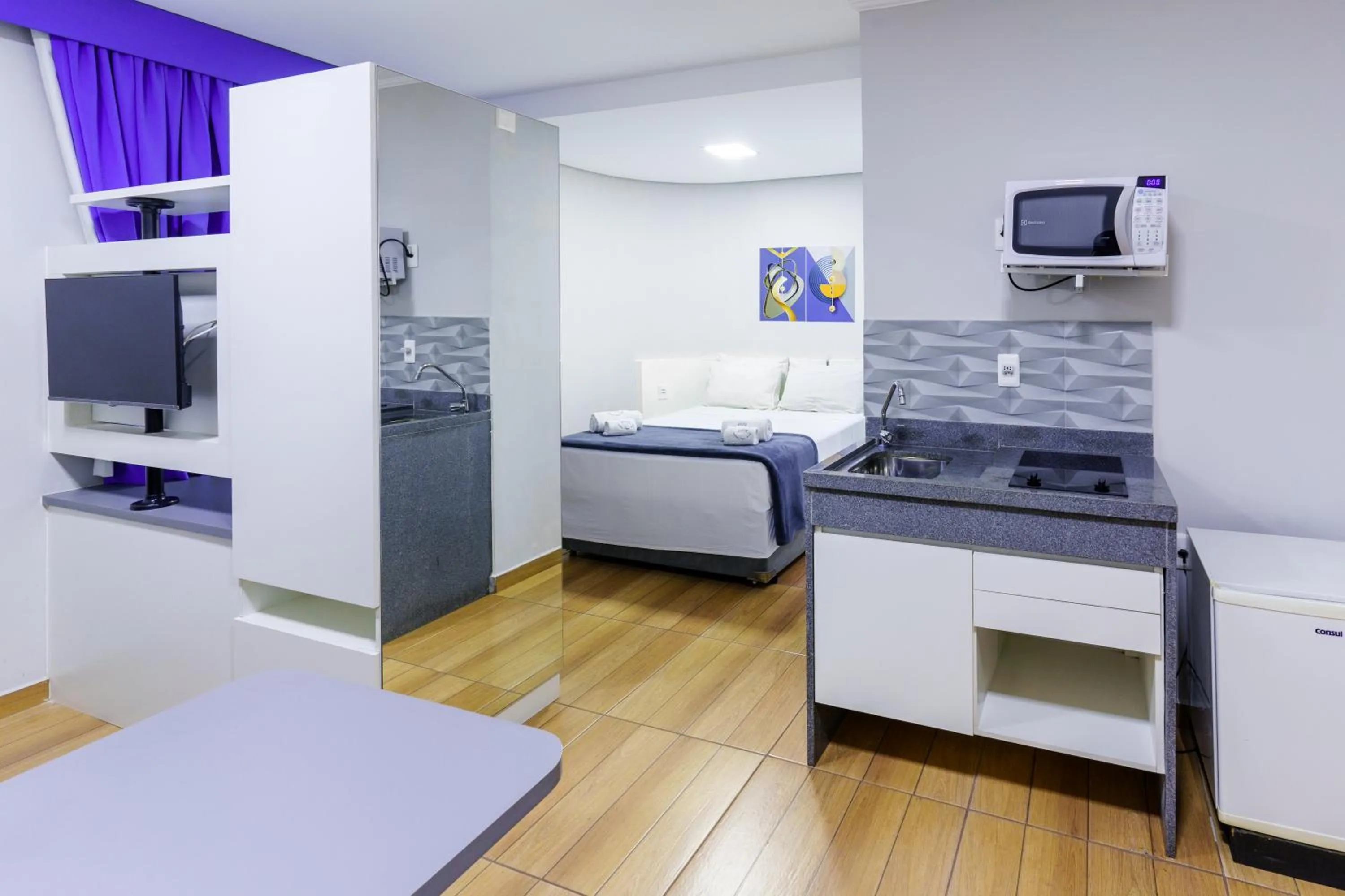 Bed in Carillon Plaza Hotel