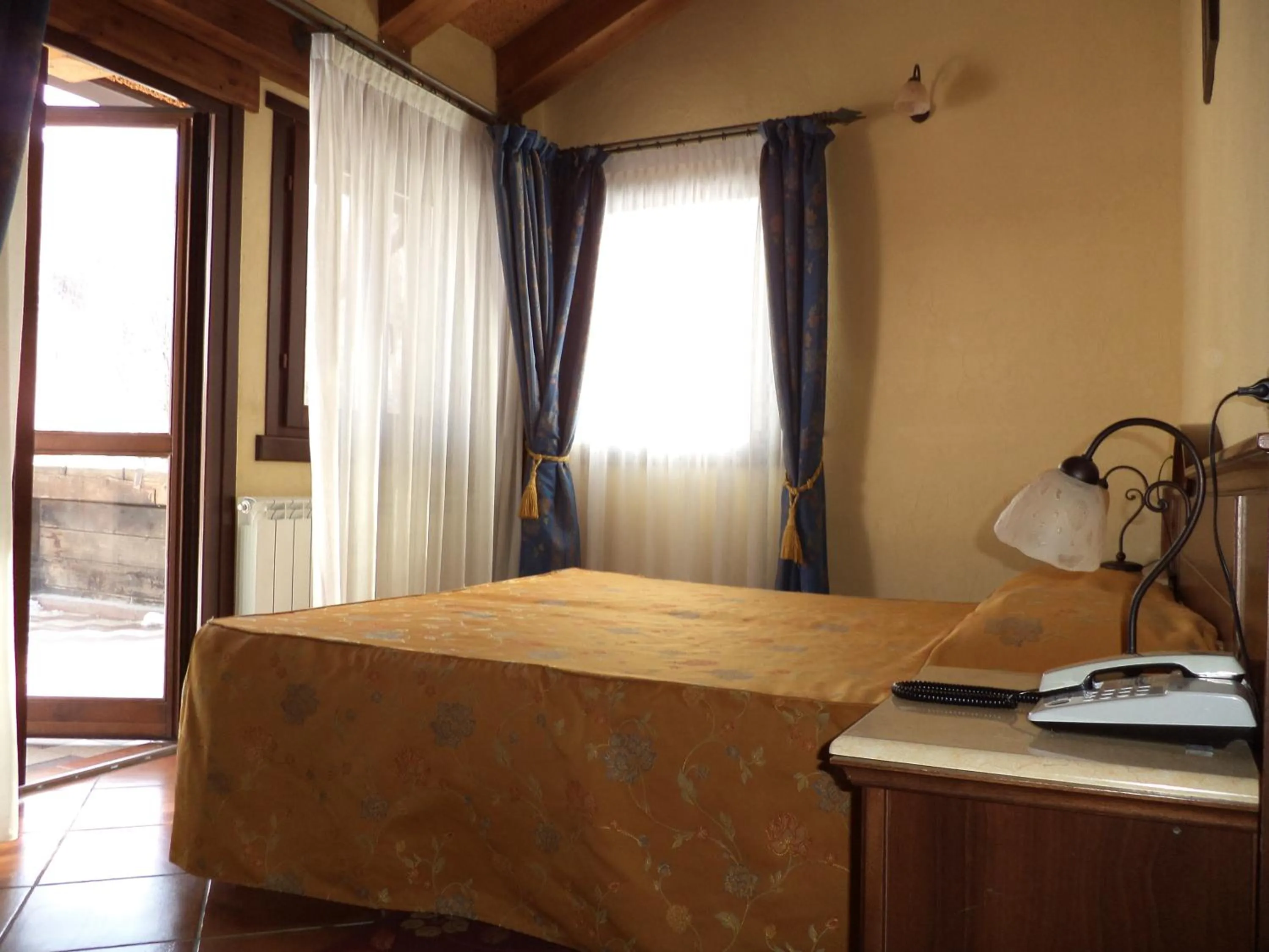 Bed in Hotel Cà Fiore