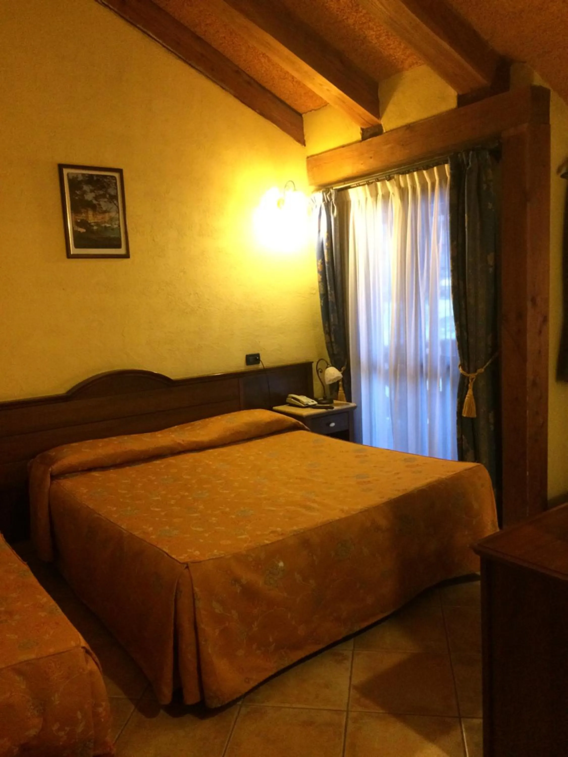 Bed in Hotel Cà Fiore