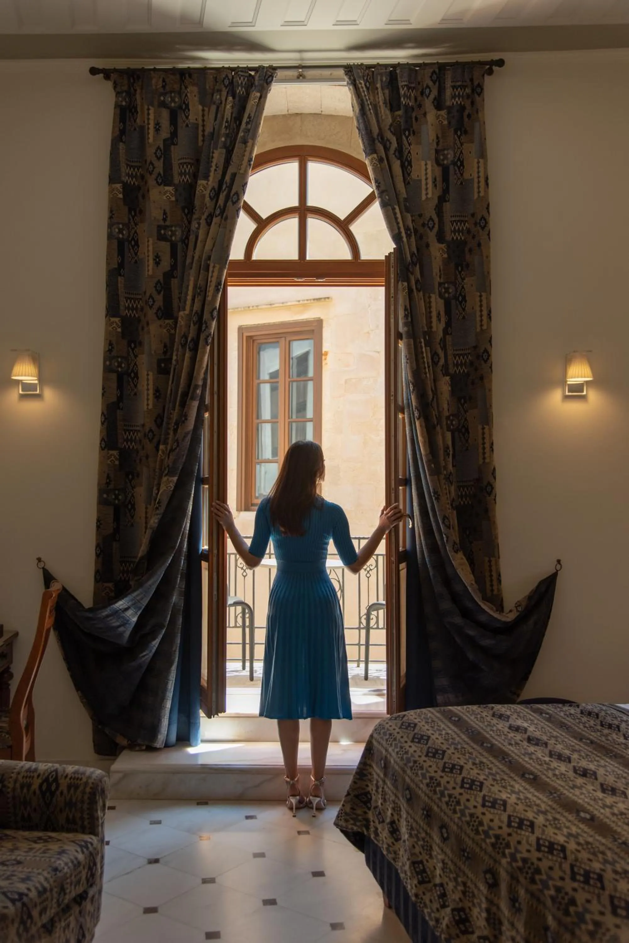 Bed in Casa Delfino Hotel & Spa