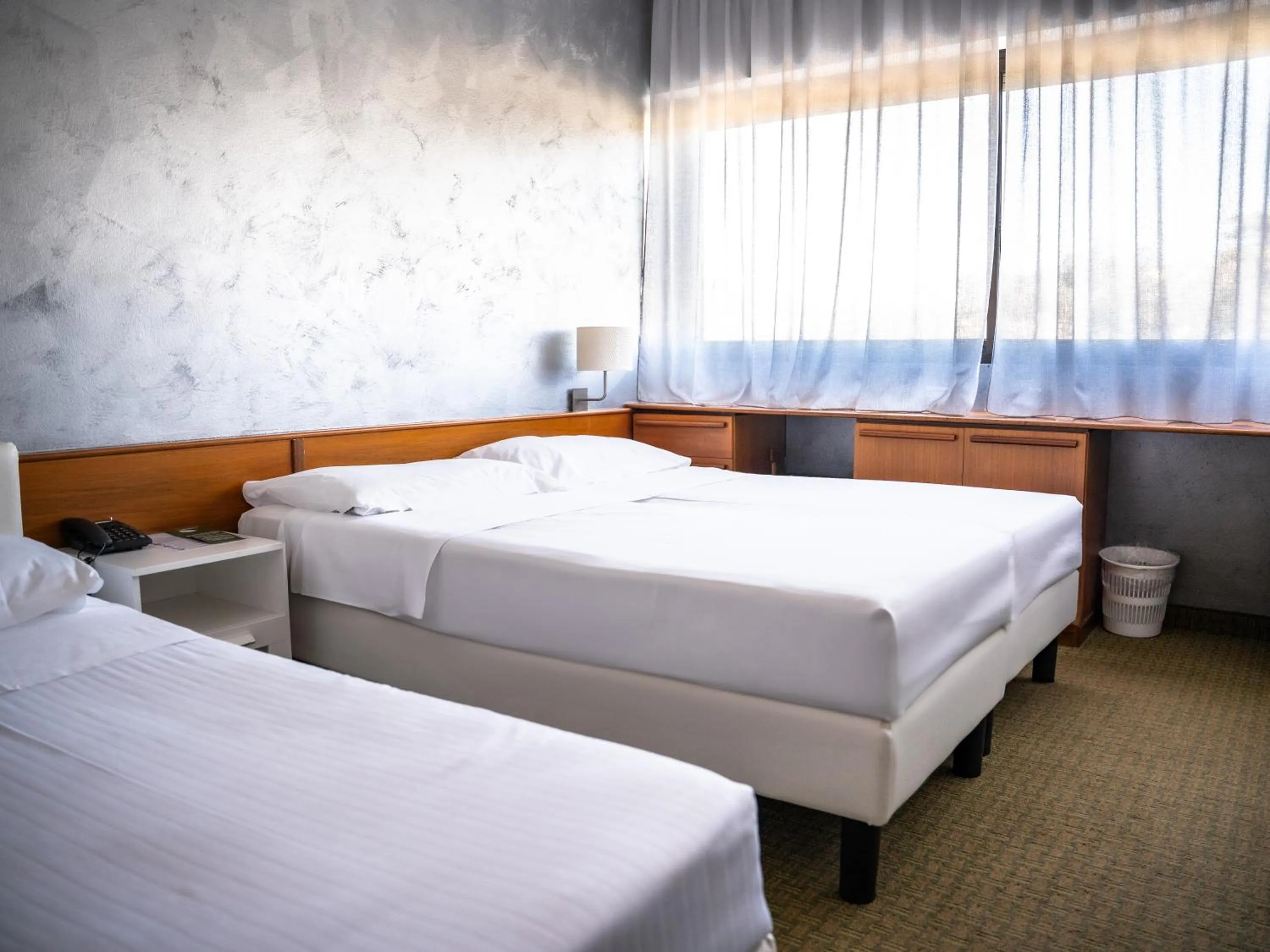 Bed in Hotel Valpolicella International