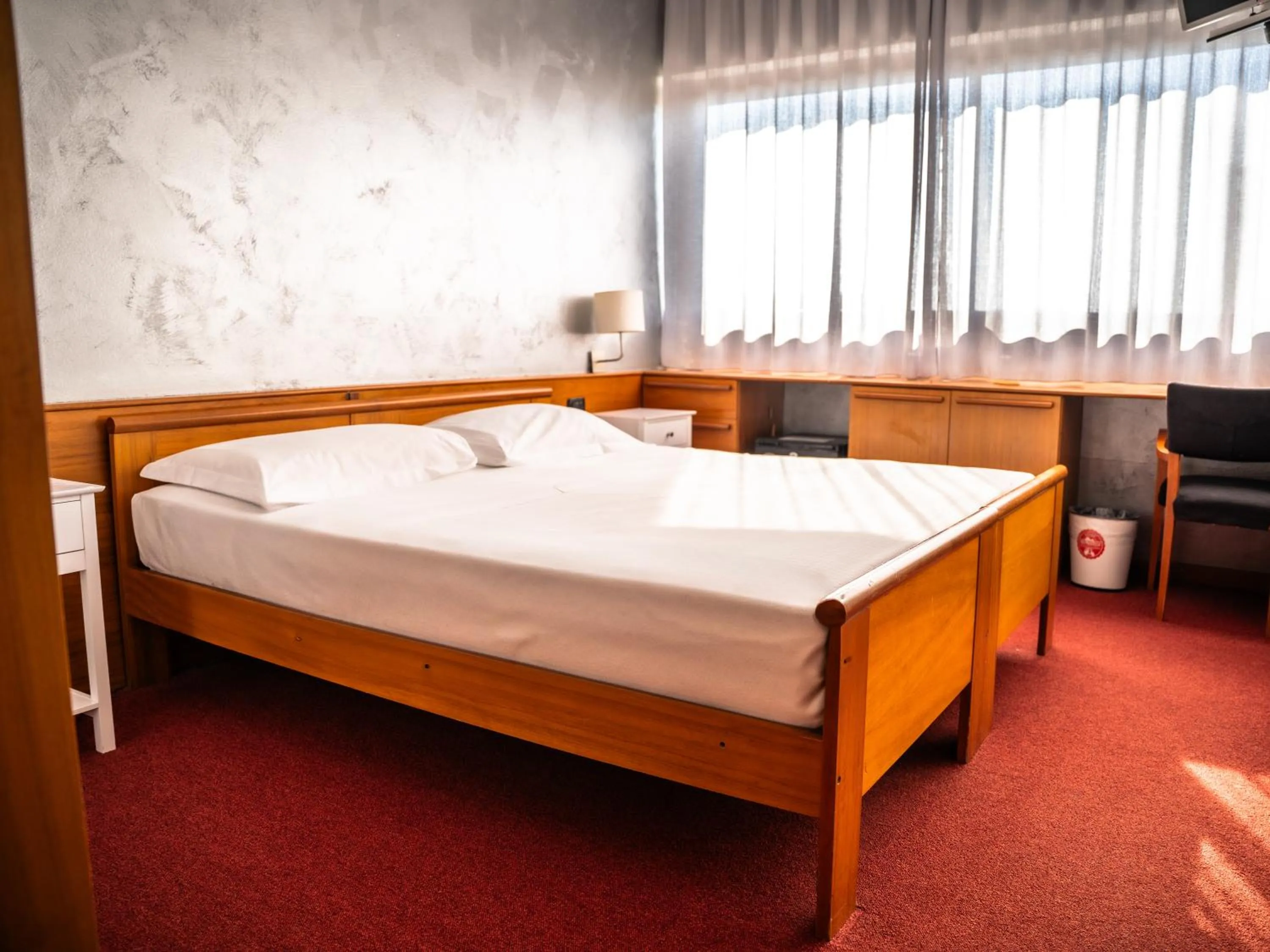 Bed in Hotel Valpolicella International