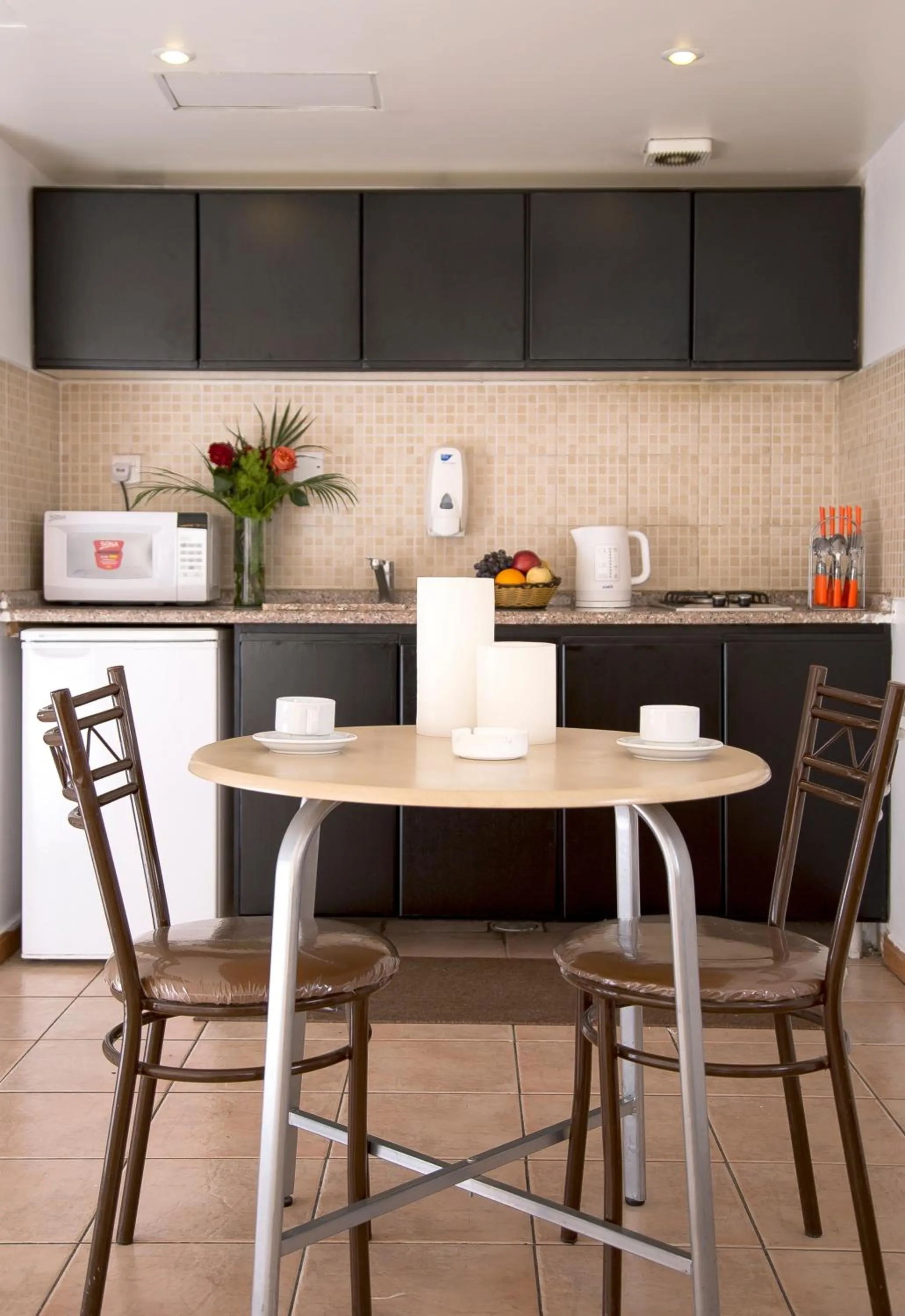 Kitchen or kitchenette in Barakat Hotel Apartments