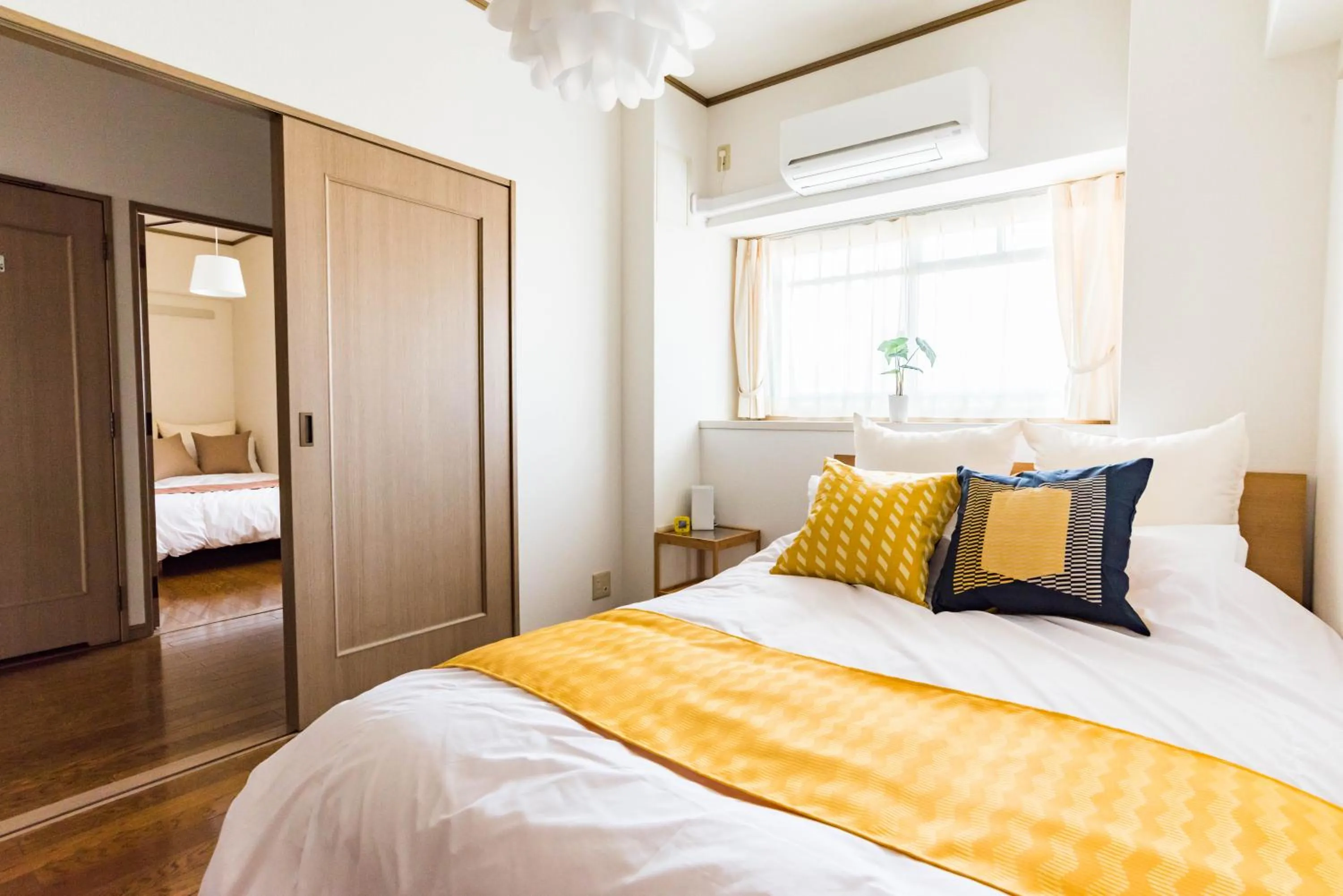 Bed in Universal Bay Condominium