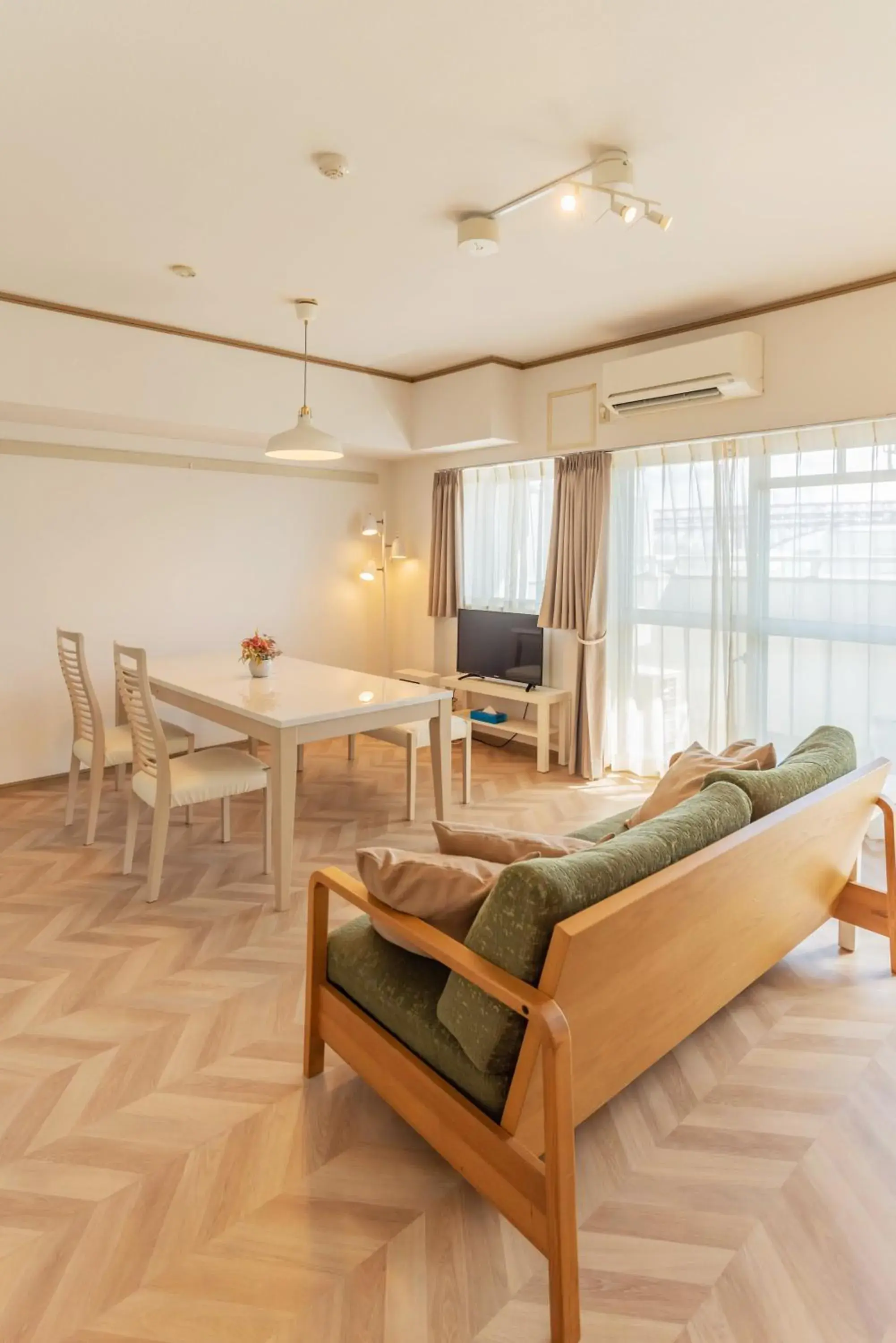 Living room, Bed in Universal Bay Condominium Living room, Bed in Universal Bay Condominium