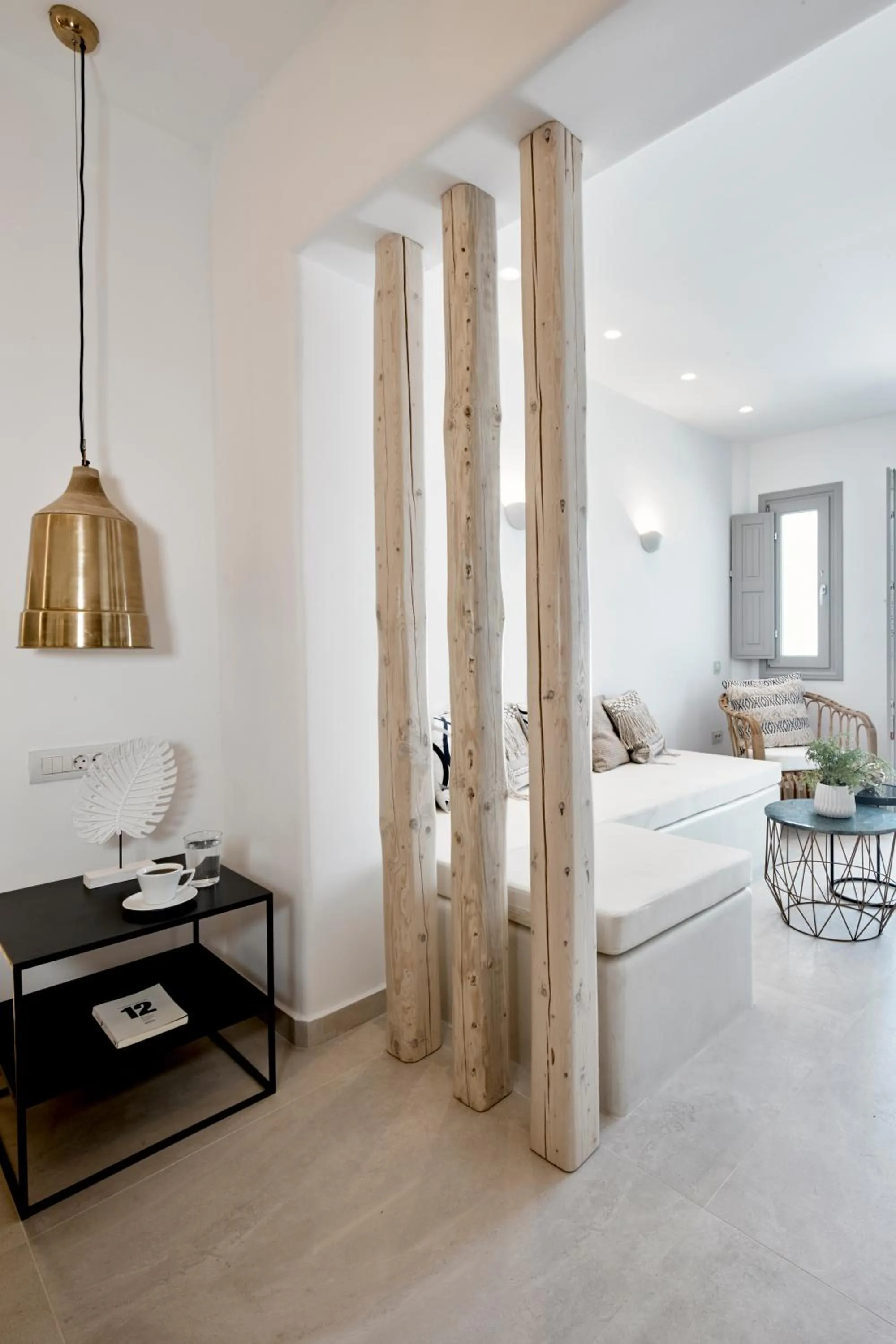 Living room, Bed in Phos The Boutique