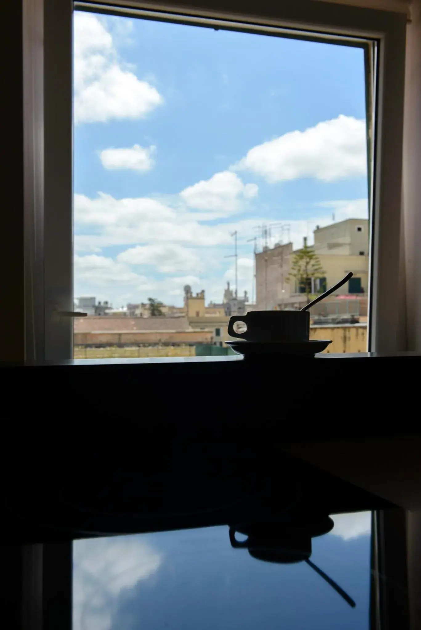 Communal lounge/ TV room in At Home Townhouse - Filiberto Communal lounge/ TV room in At Home Townhouse - Filiberto