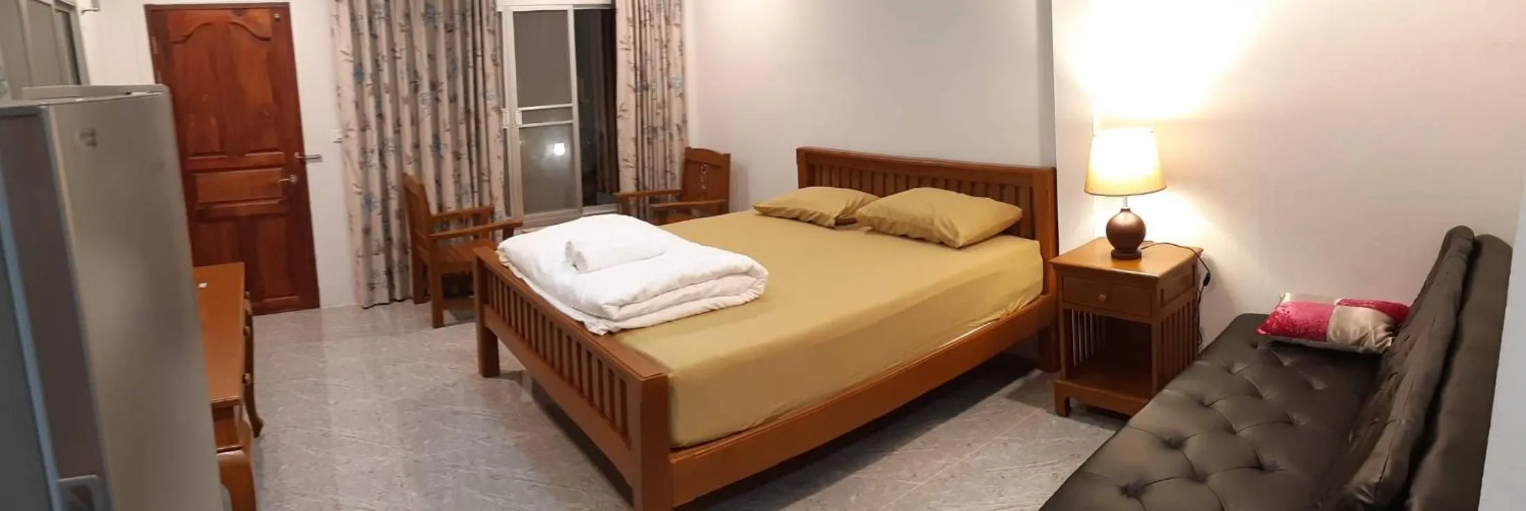 Bed in Green Mango Resort