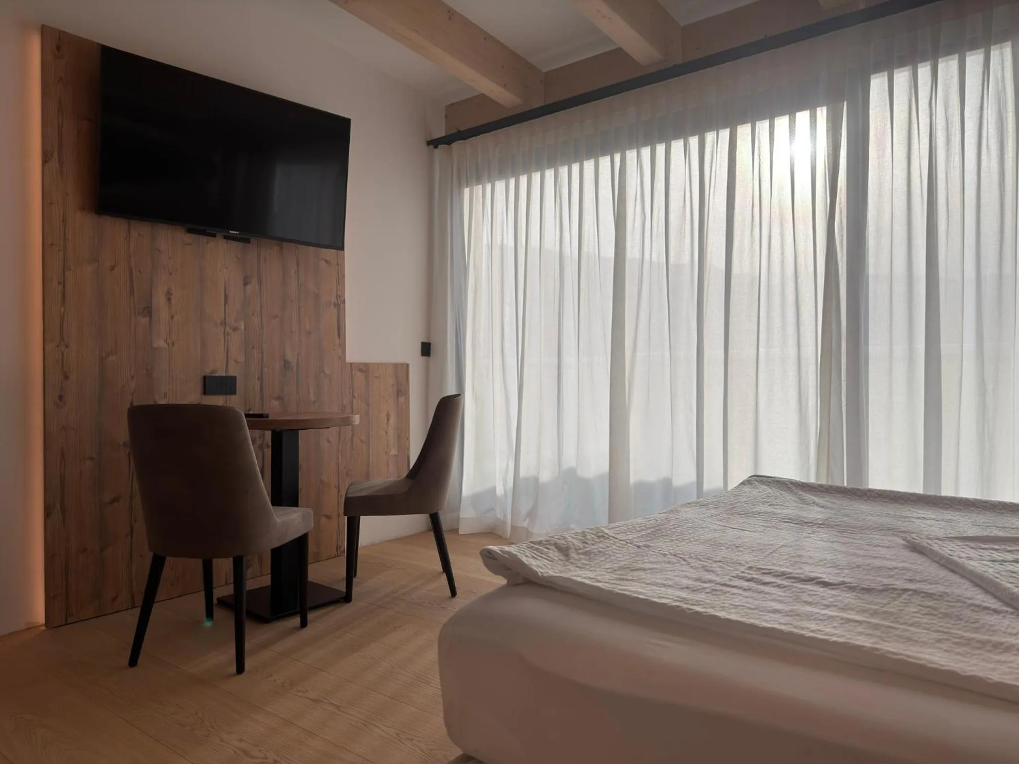 Bed in Liz Hotel & Apartments