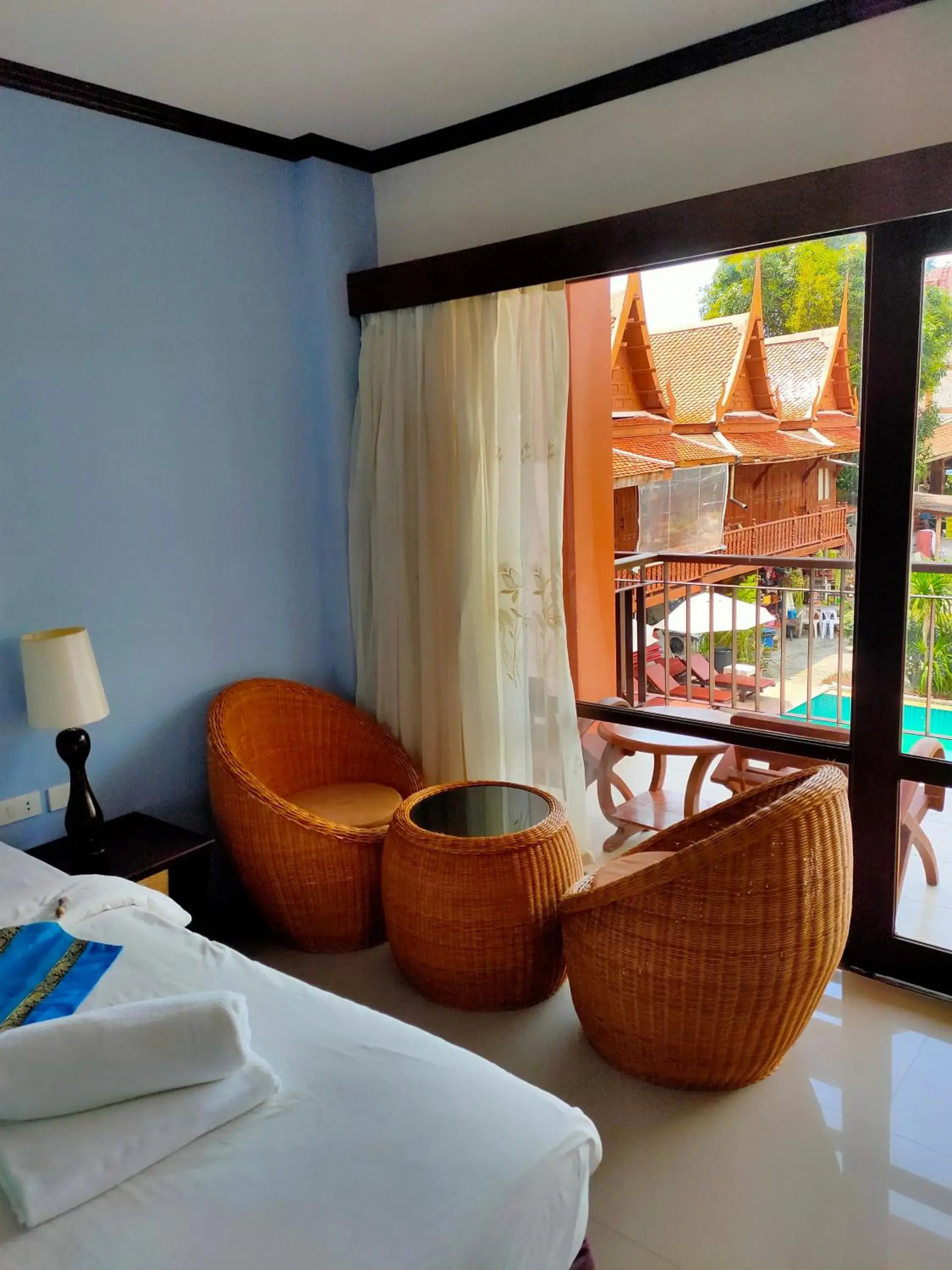 Seating area, Bed in Grand Thai House Resort Seating area, Bed in Grand Thai House Resort