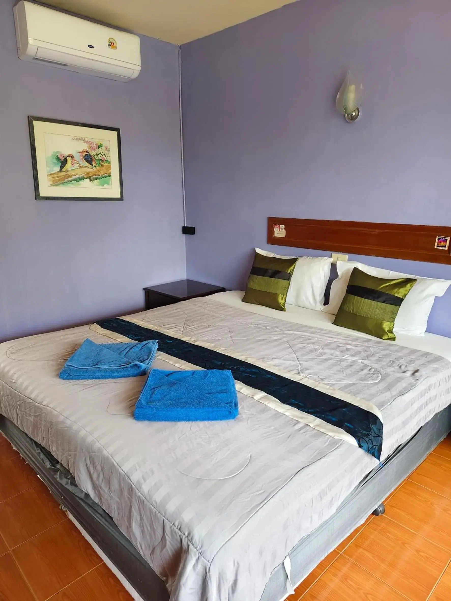 Bed in Grand Thai House Resort Lamai Bed in Grand Thai House Resort Lamai