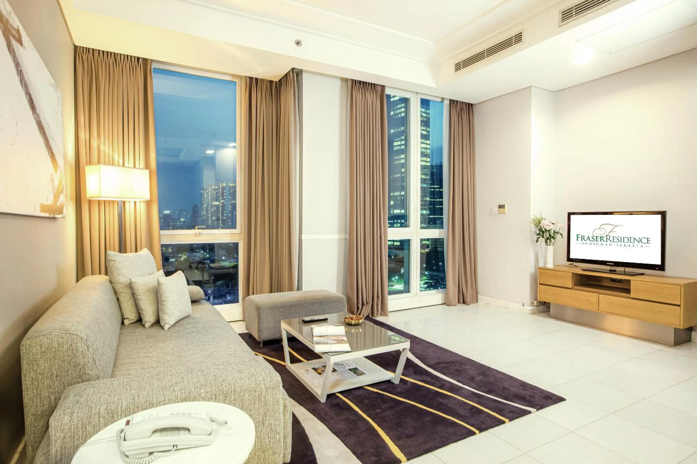 Living room in Fraser Residence Sudirman Jakarta