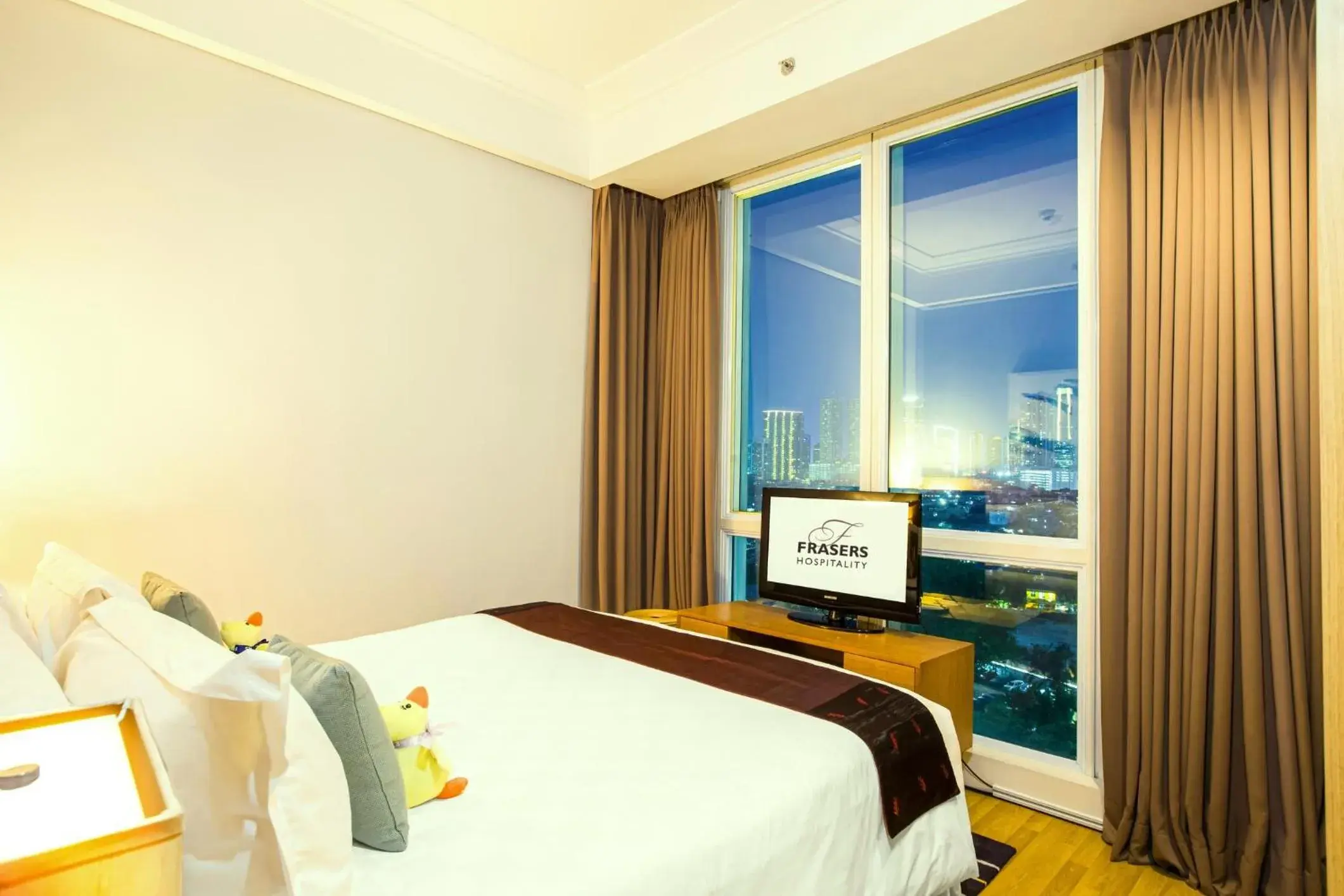 View (from property/room), Bed in Fraser Residence Sudirman Jakarta View (from property/room), Bed in Fraser Residence Sudirman Jakarta