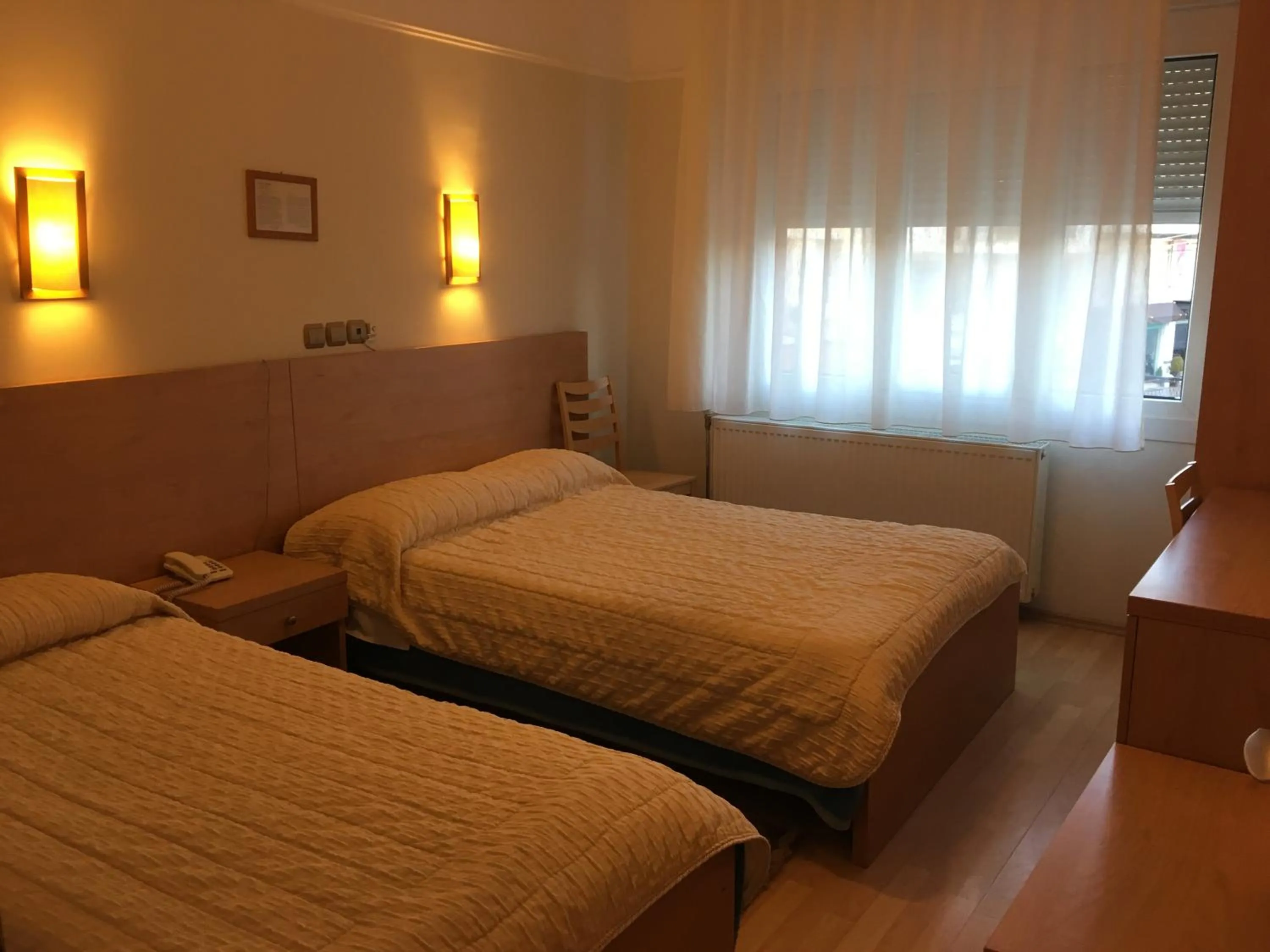 Bed in Hotel Orestion - Bike and motorcycle friendly hotel