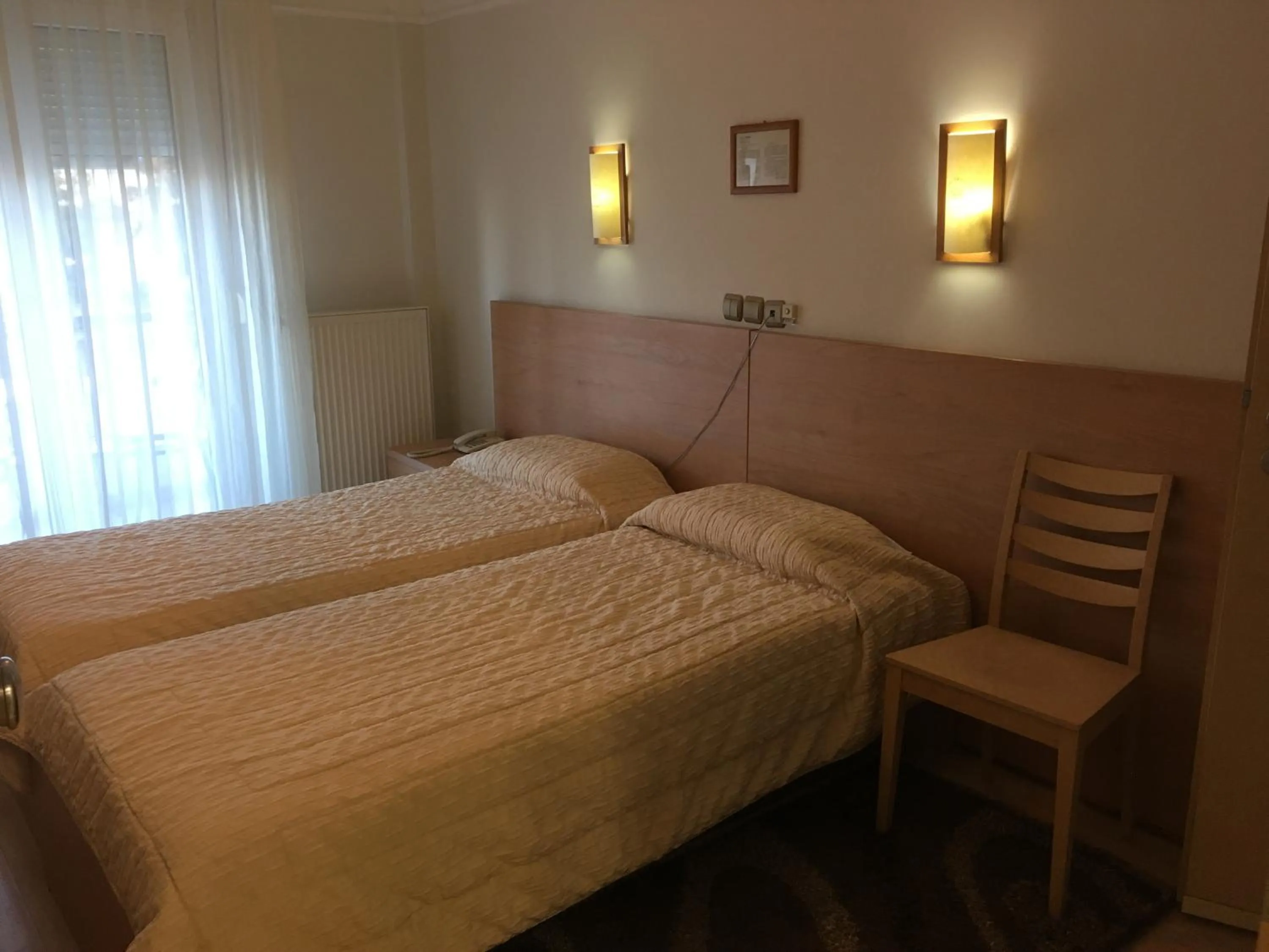 Bed in Hotel Orestion - Bike and motorcycle friendly hotel