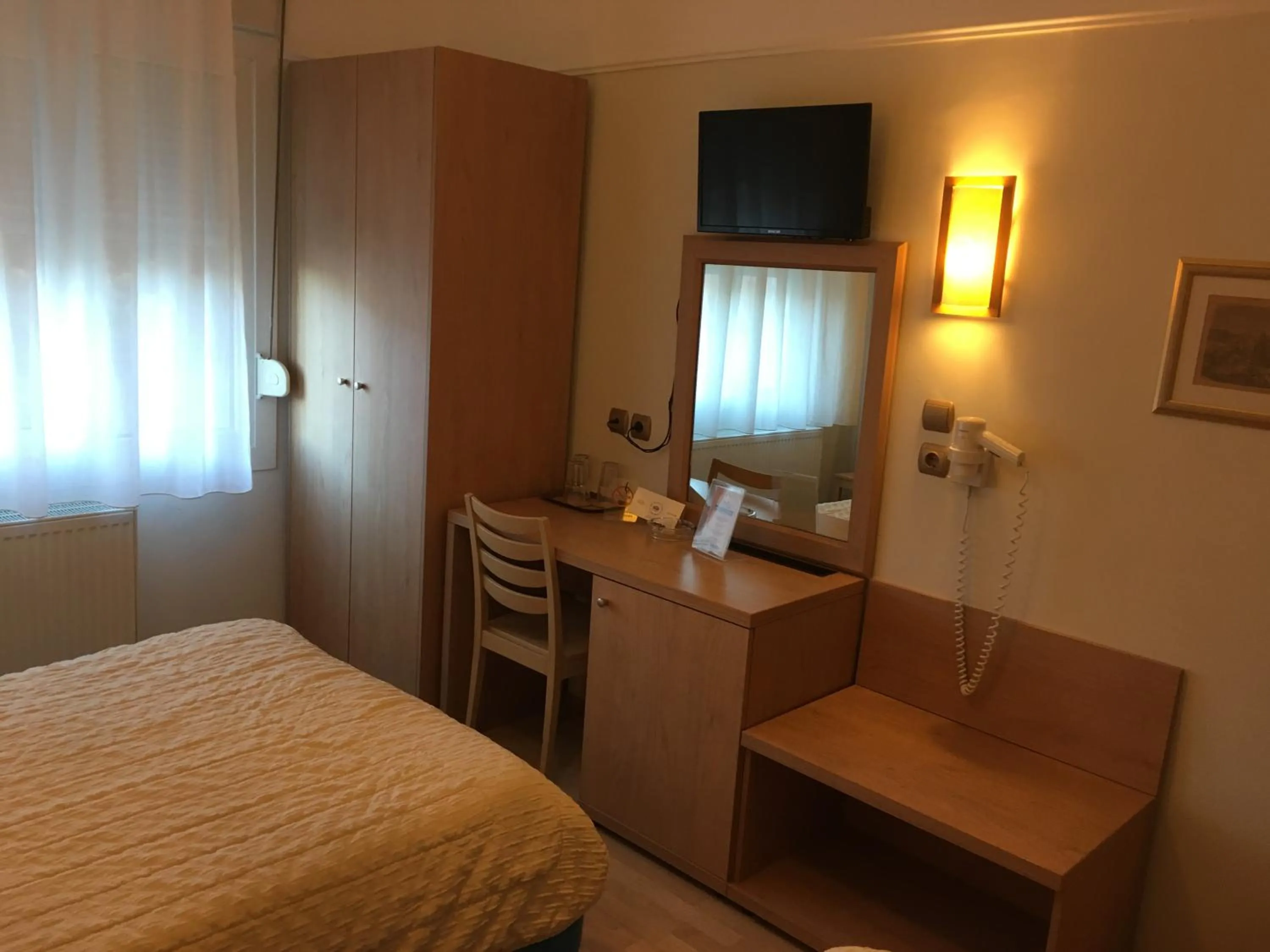 Bed in Hotel Orestion - Bike and motorcycle friendly hotel