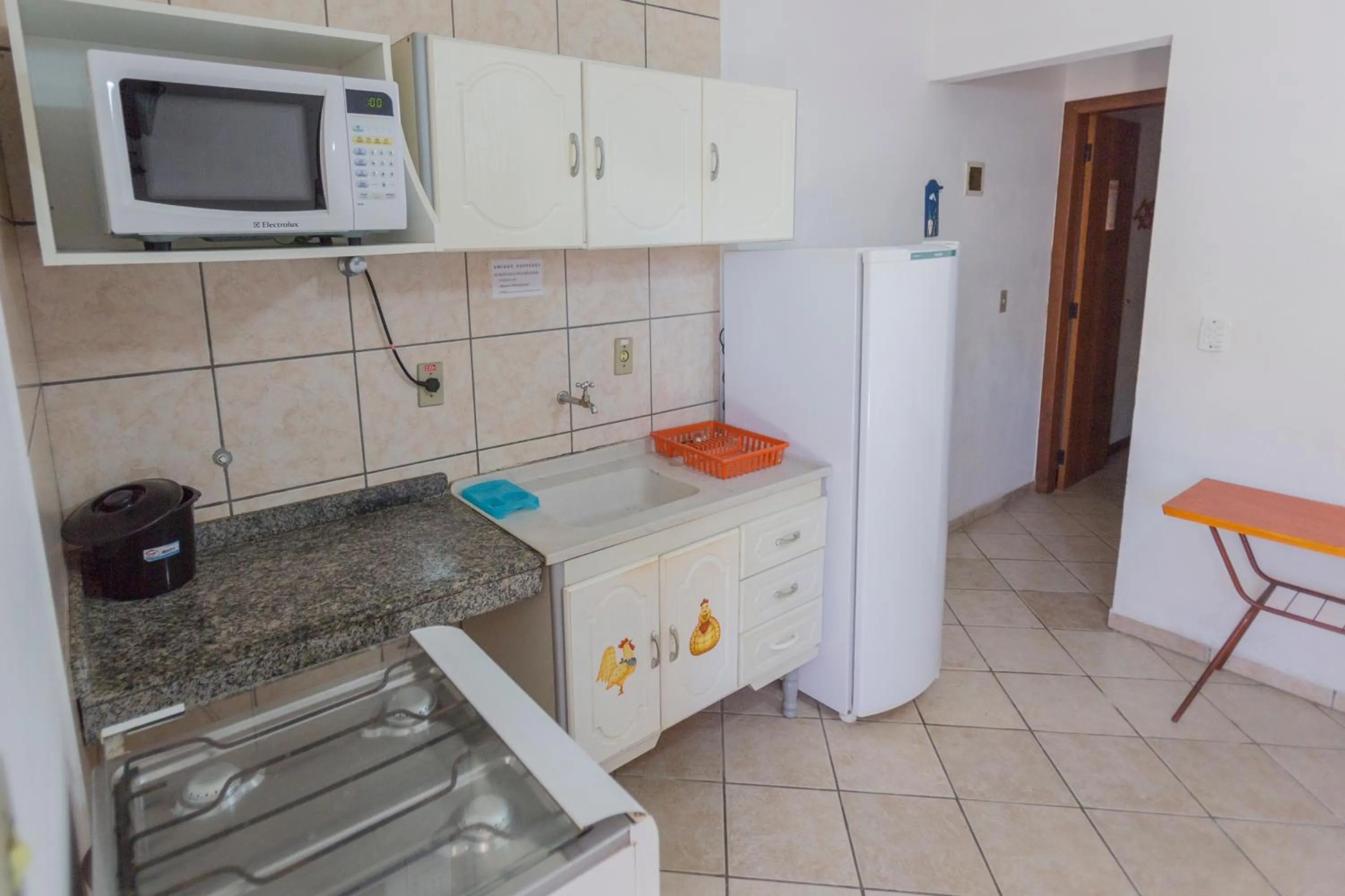 Kitchen or kitchenette in Residencial Praia Bombas