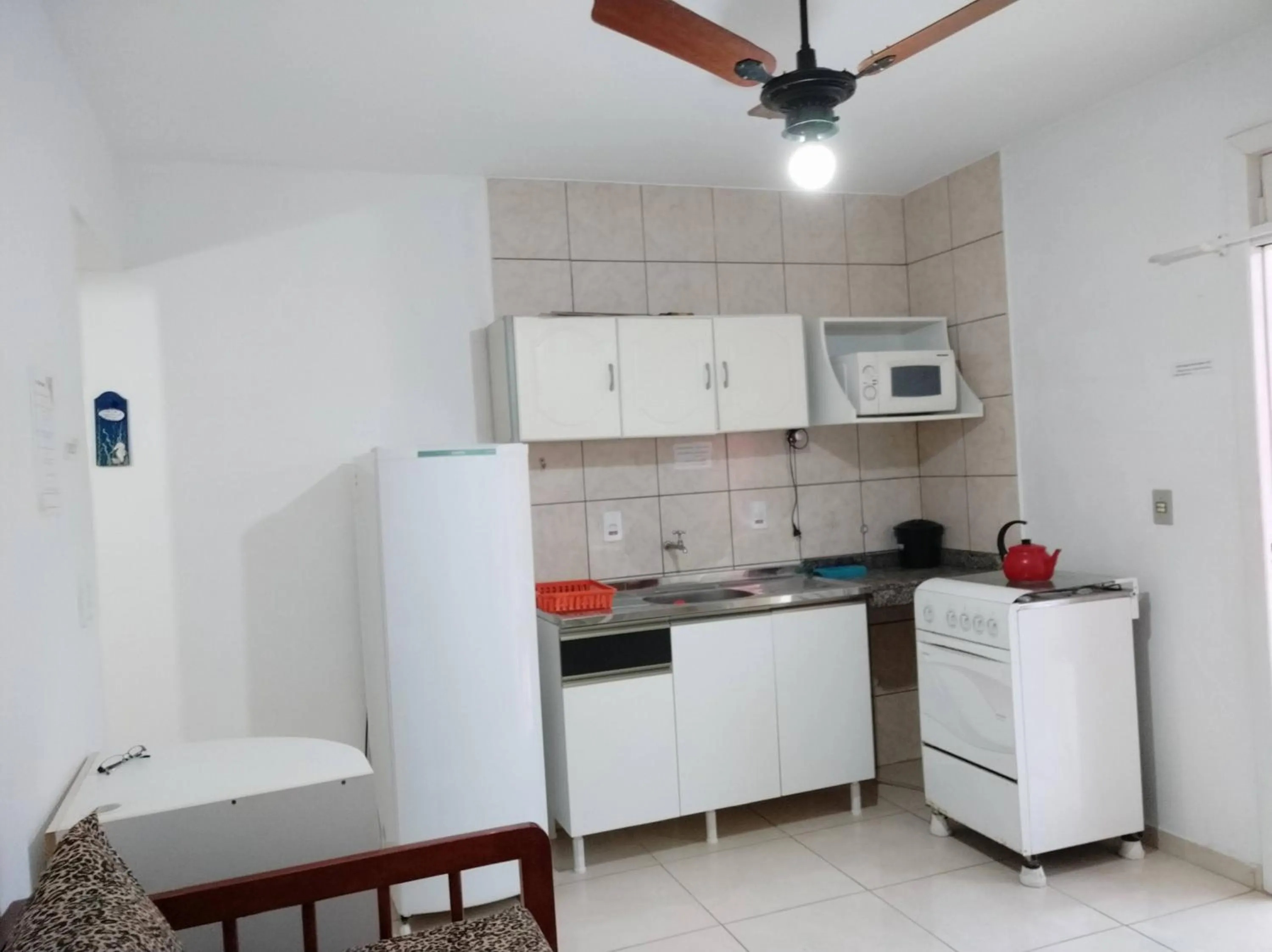 Kitchen or kitchenette in Residencial Praia Bombas