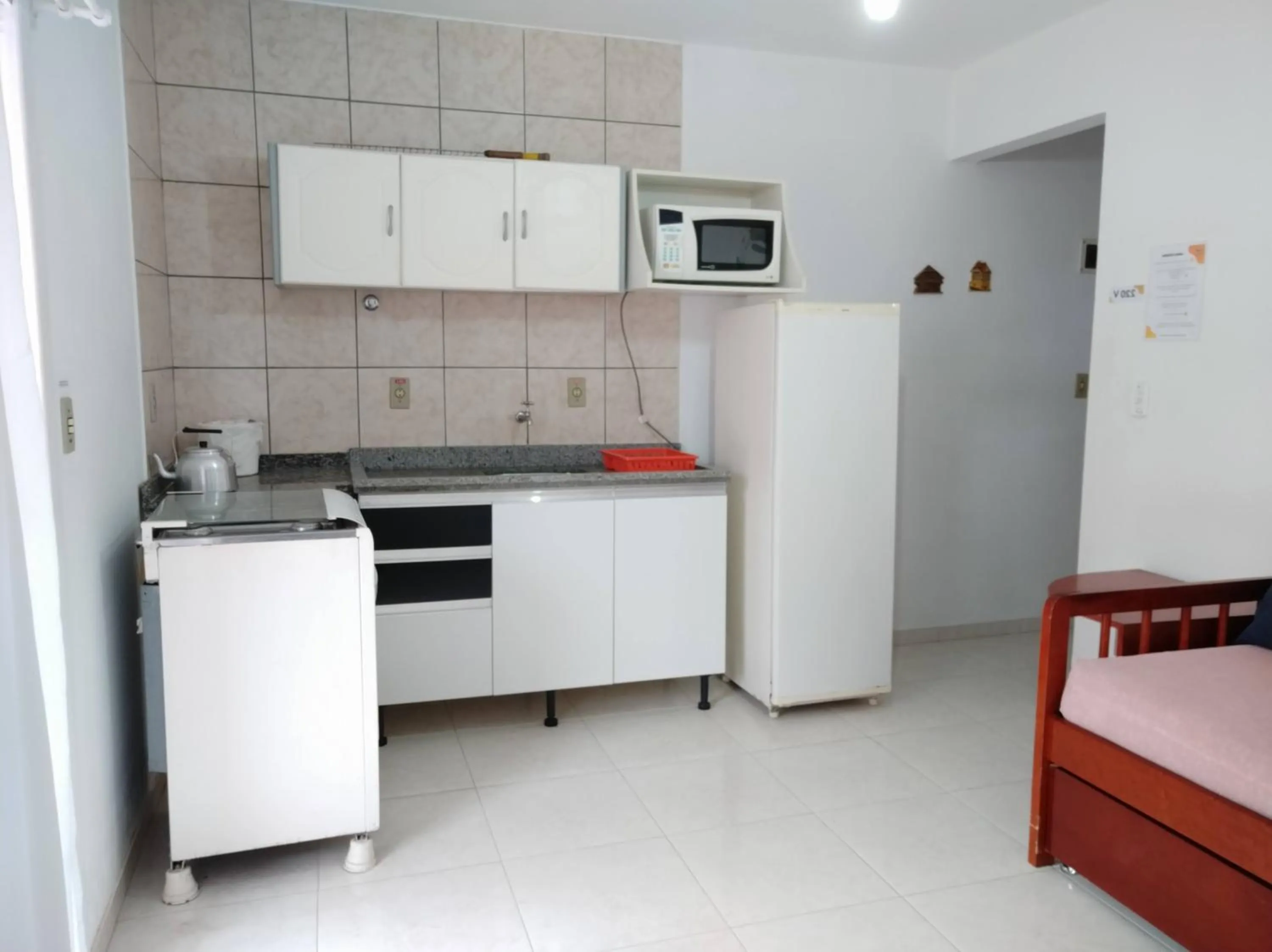 Kitchen or kitchenette in Residencial Praia Bombas