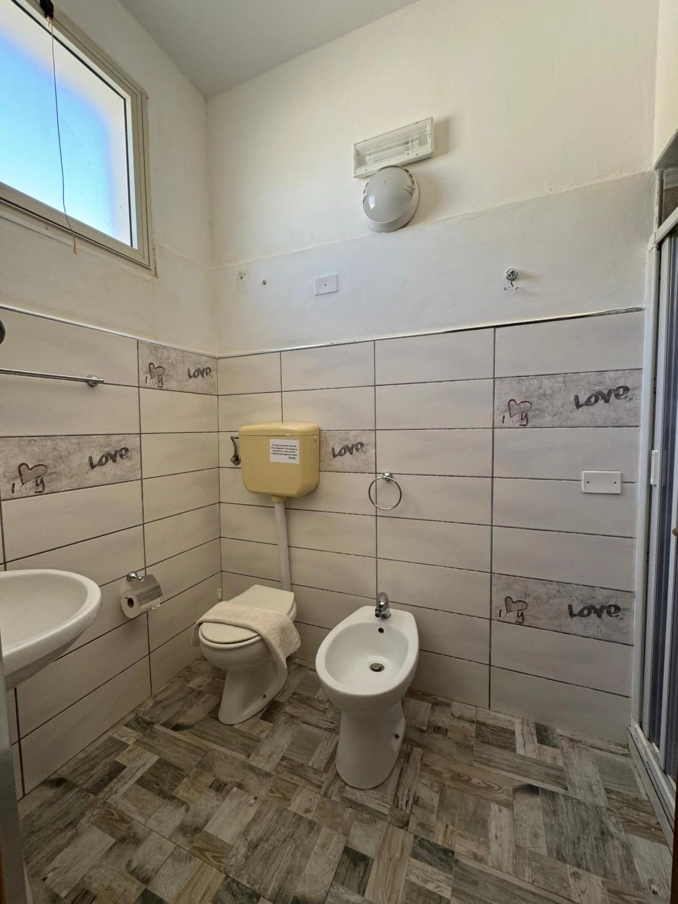 Toilet in Residence La Conchiglia