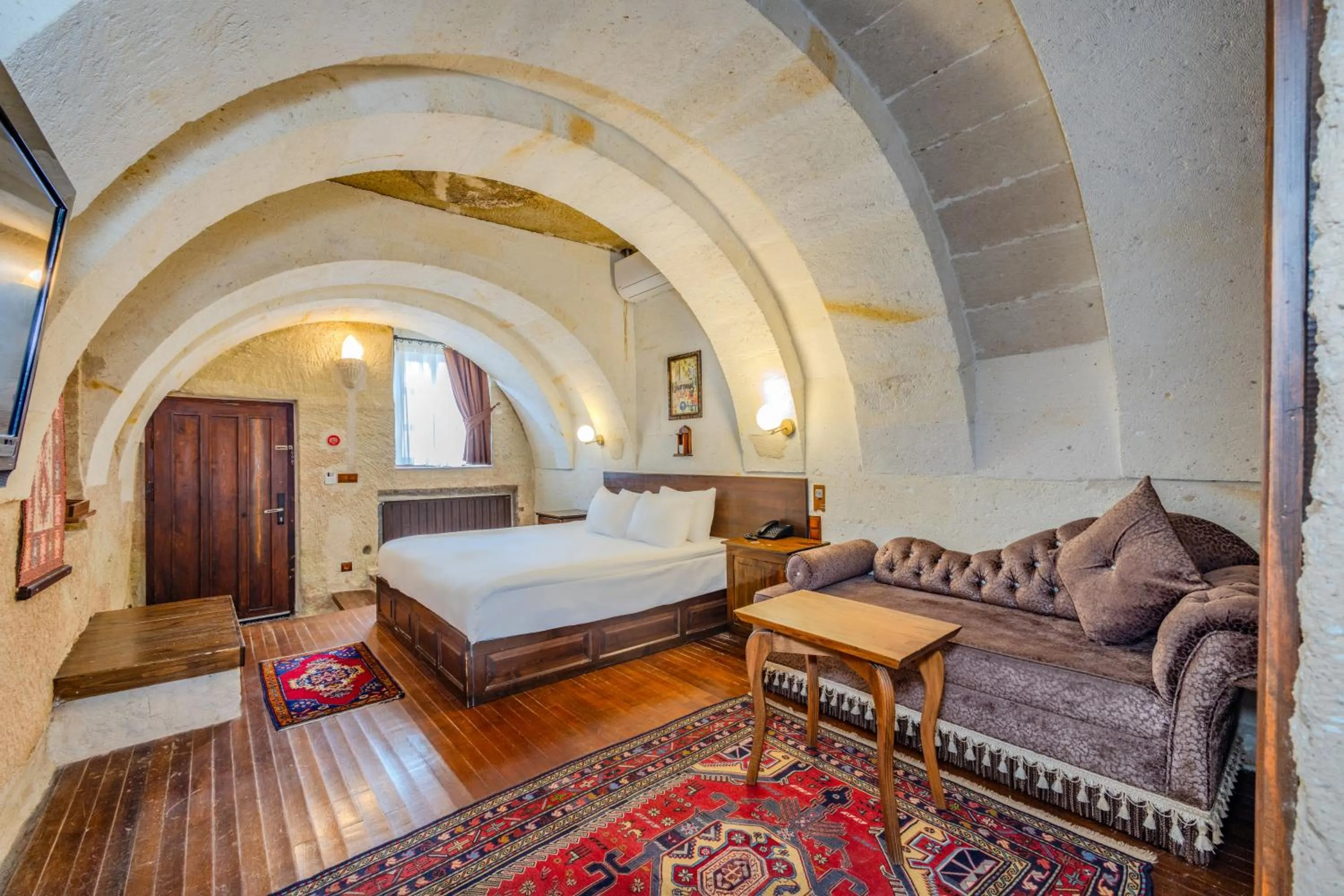 Bed in MDC Cave Hotel Cappadocia
