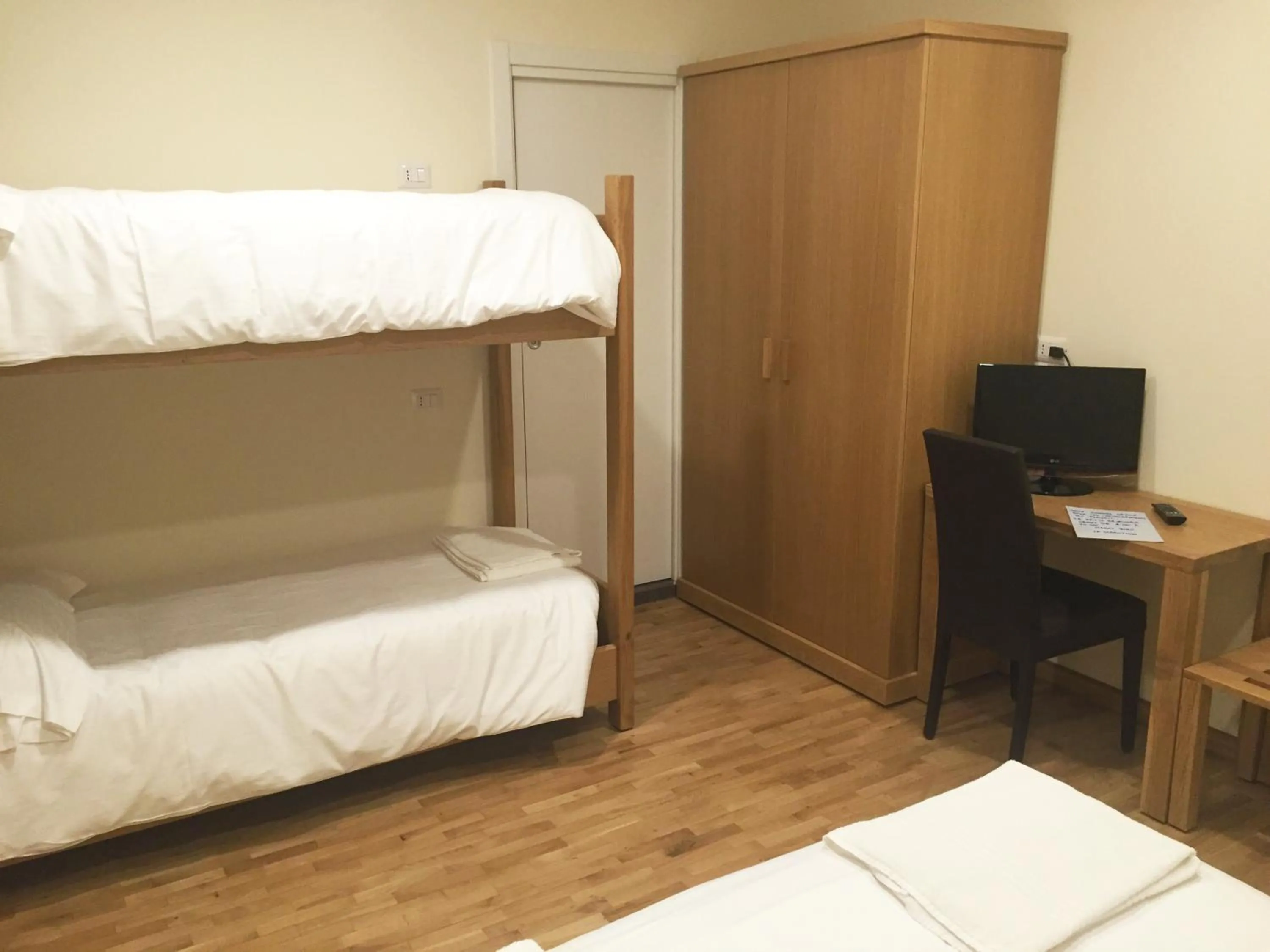 Photo of the whole room, Bed in Hotel Trieste