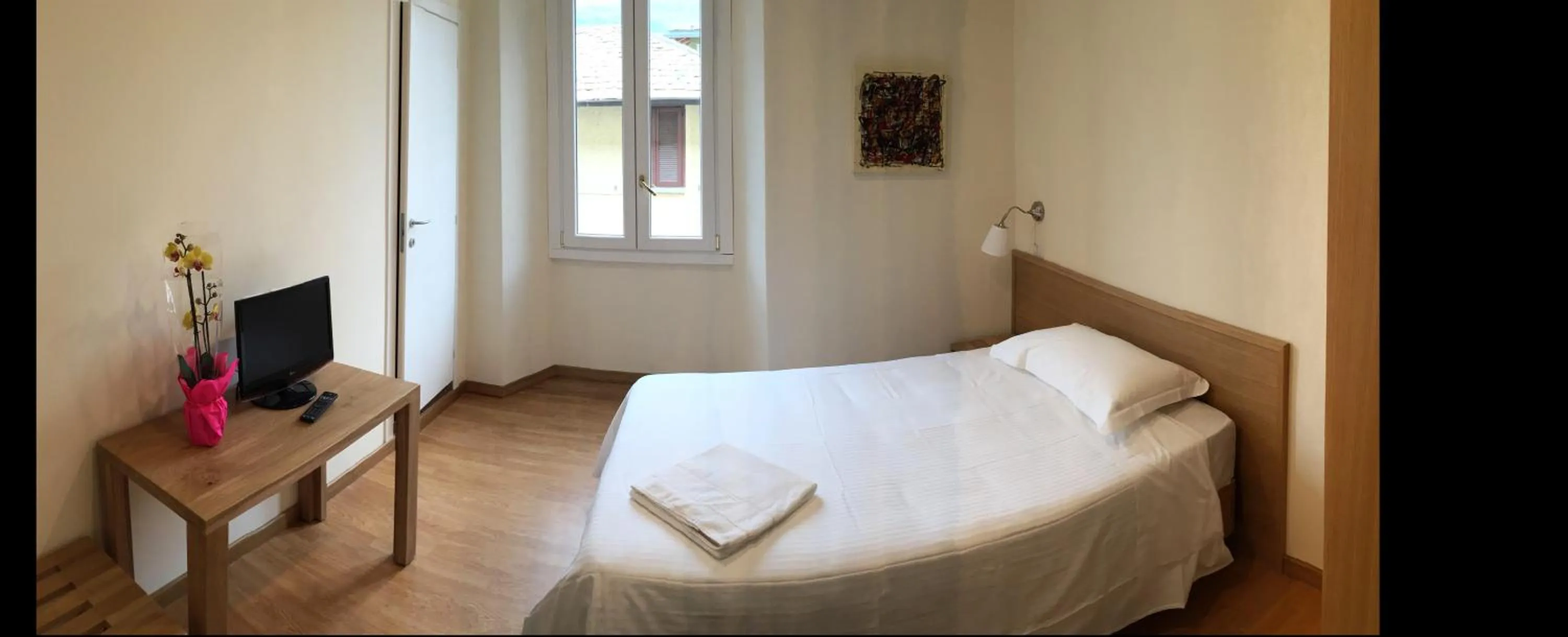 Photo of the whole room, Bed in Hotel Trieste